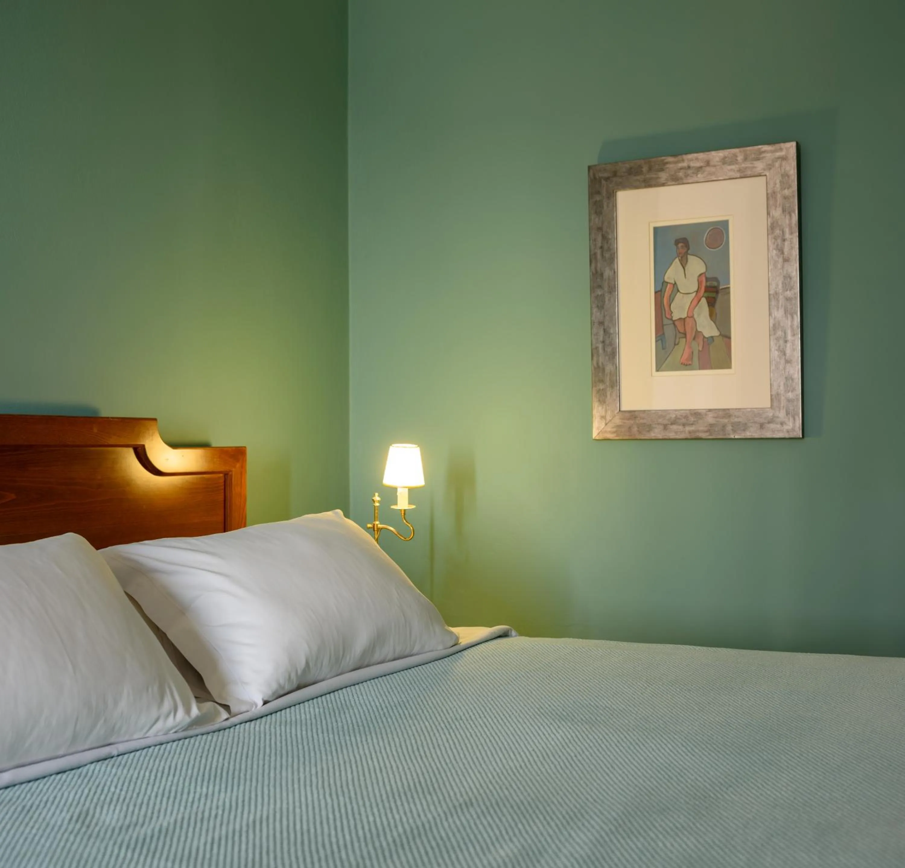 Bed in Villa Renos Hotel