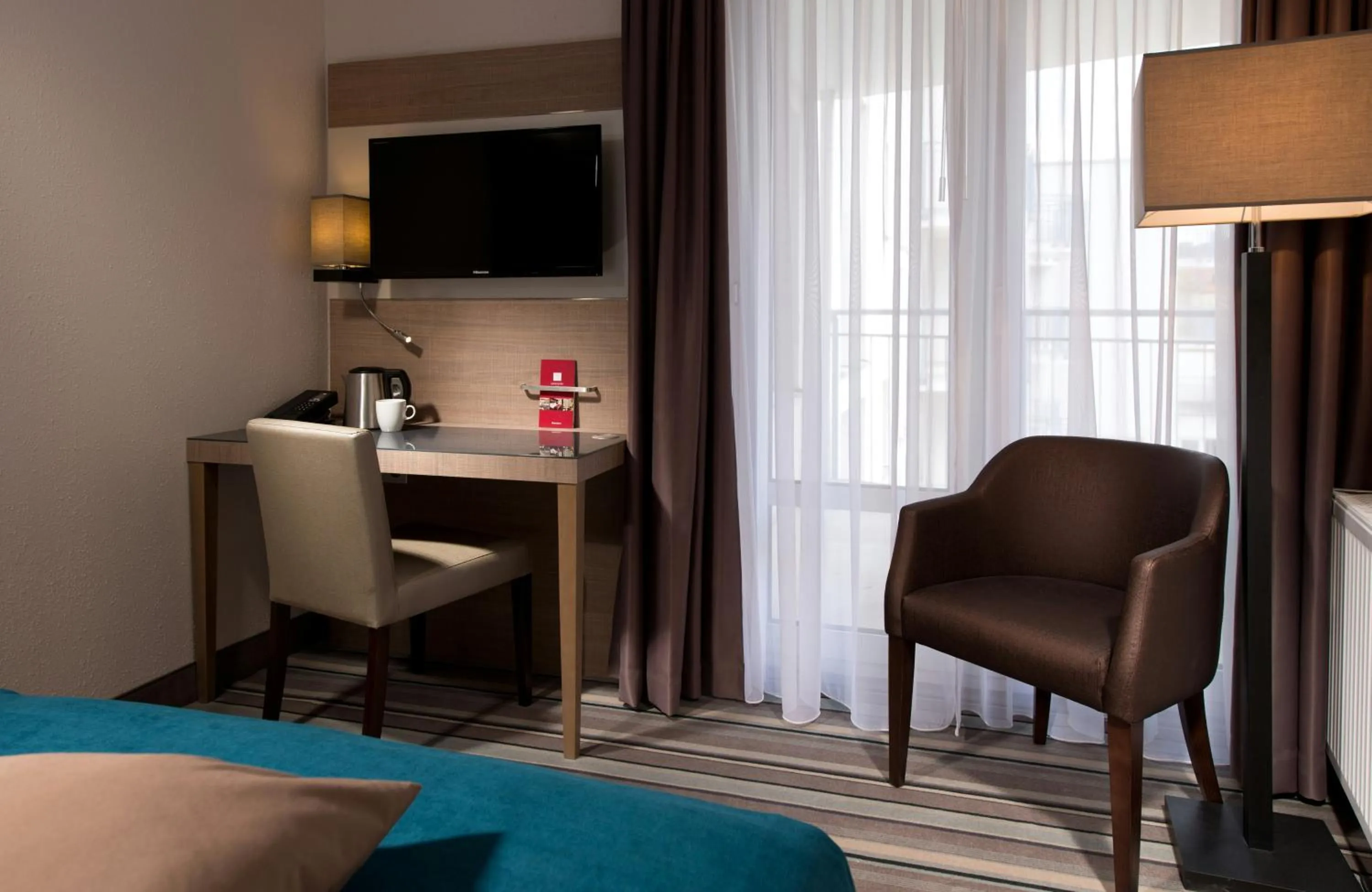 Photo of the whole room, Bed in Leonardo Hotel Munich City Olympiapark