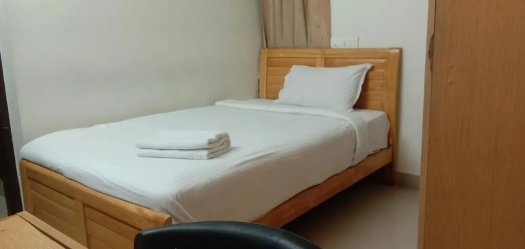 Photo of the whole room, Bed in Hotel Tri-Star Residency