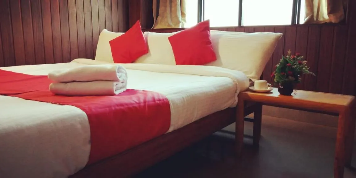 Property building, Bed in Hotel Tri-Star Residency