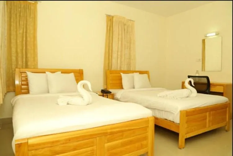 Photo of the whole room, Bed in Hotel Tri-Star Residency