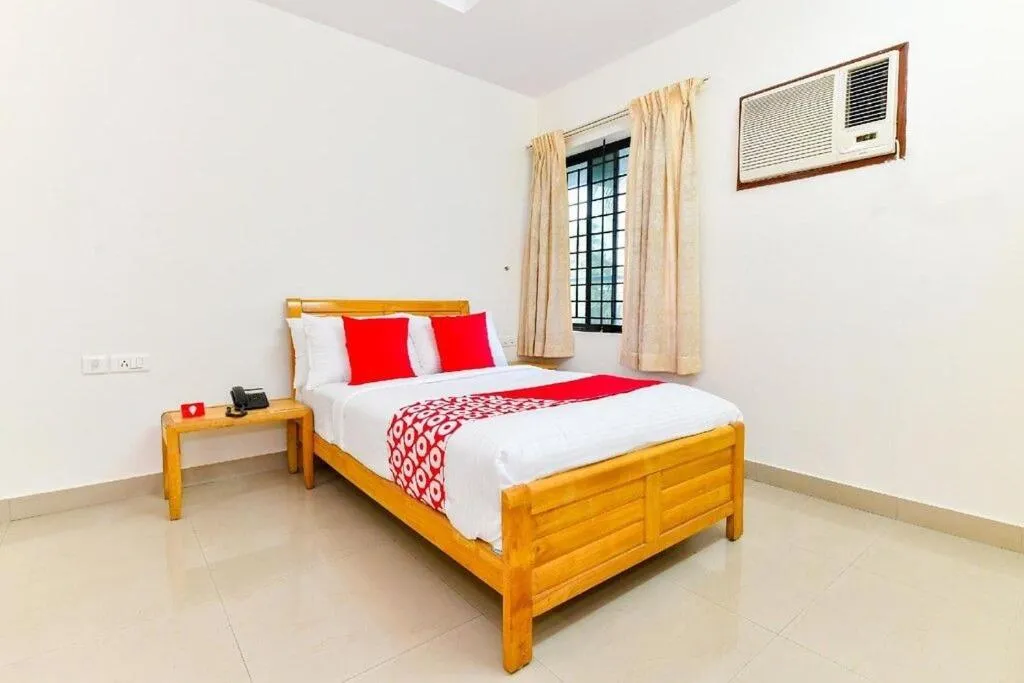 Bed in Hotel Tri-Star Residency