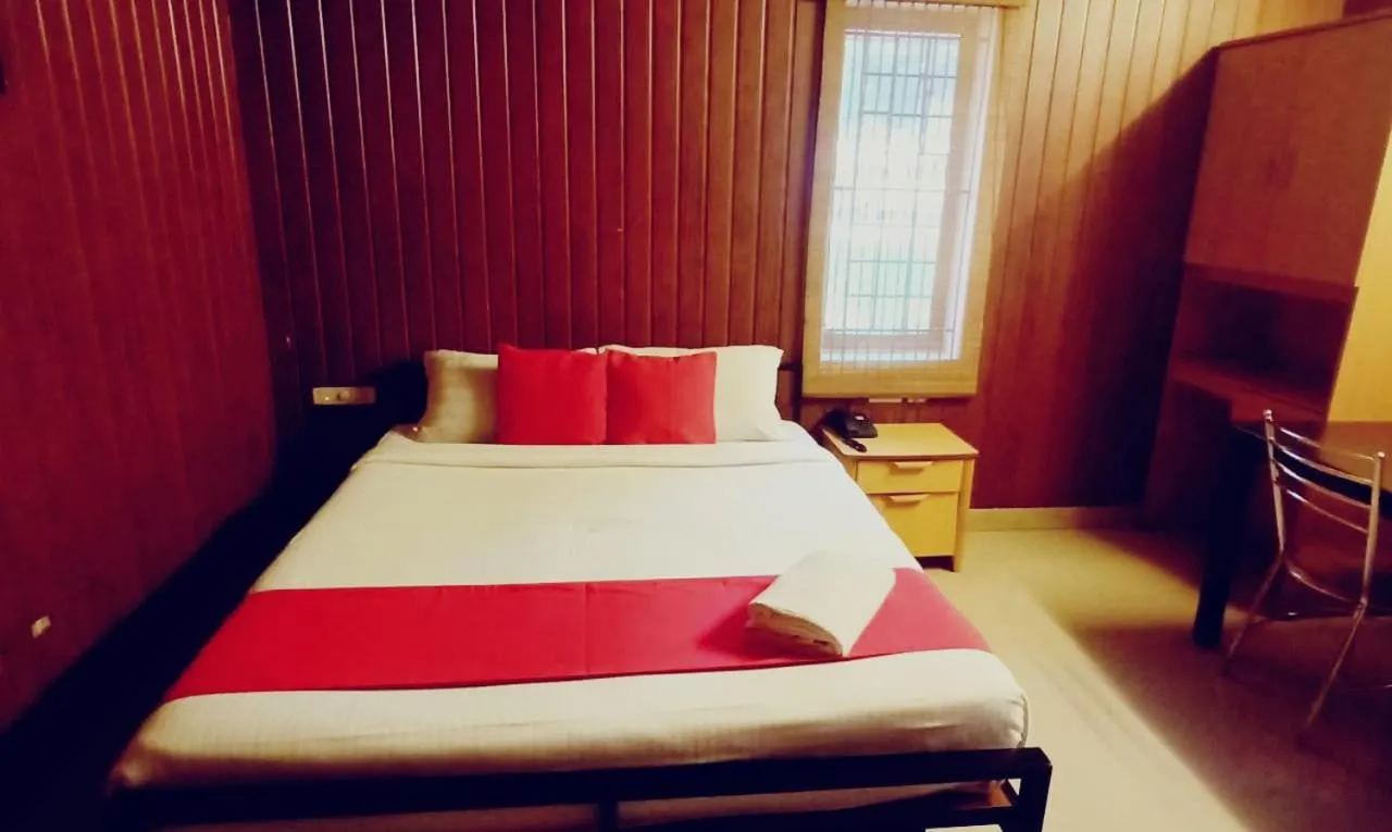 Photo of the whole room, Bed in Hotel Tri-Star Residency