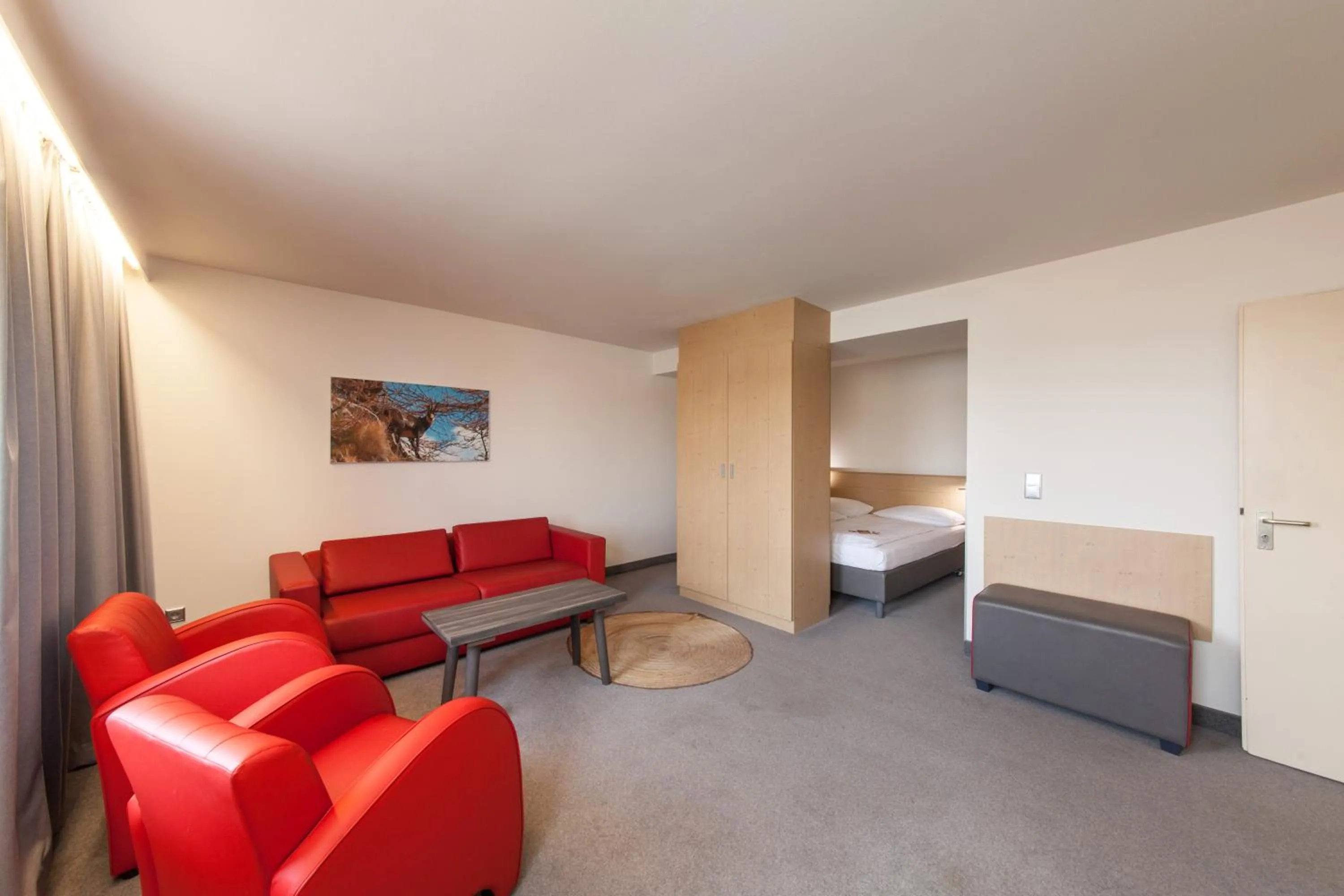 Seating area, Bed in Sure Hotel by Best Western Muenchen Hauptbahnhof