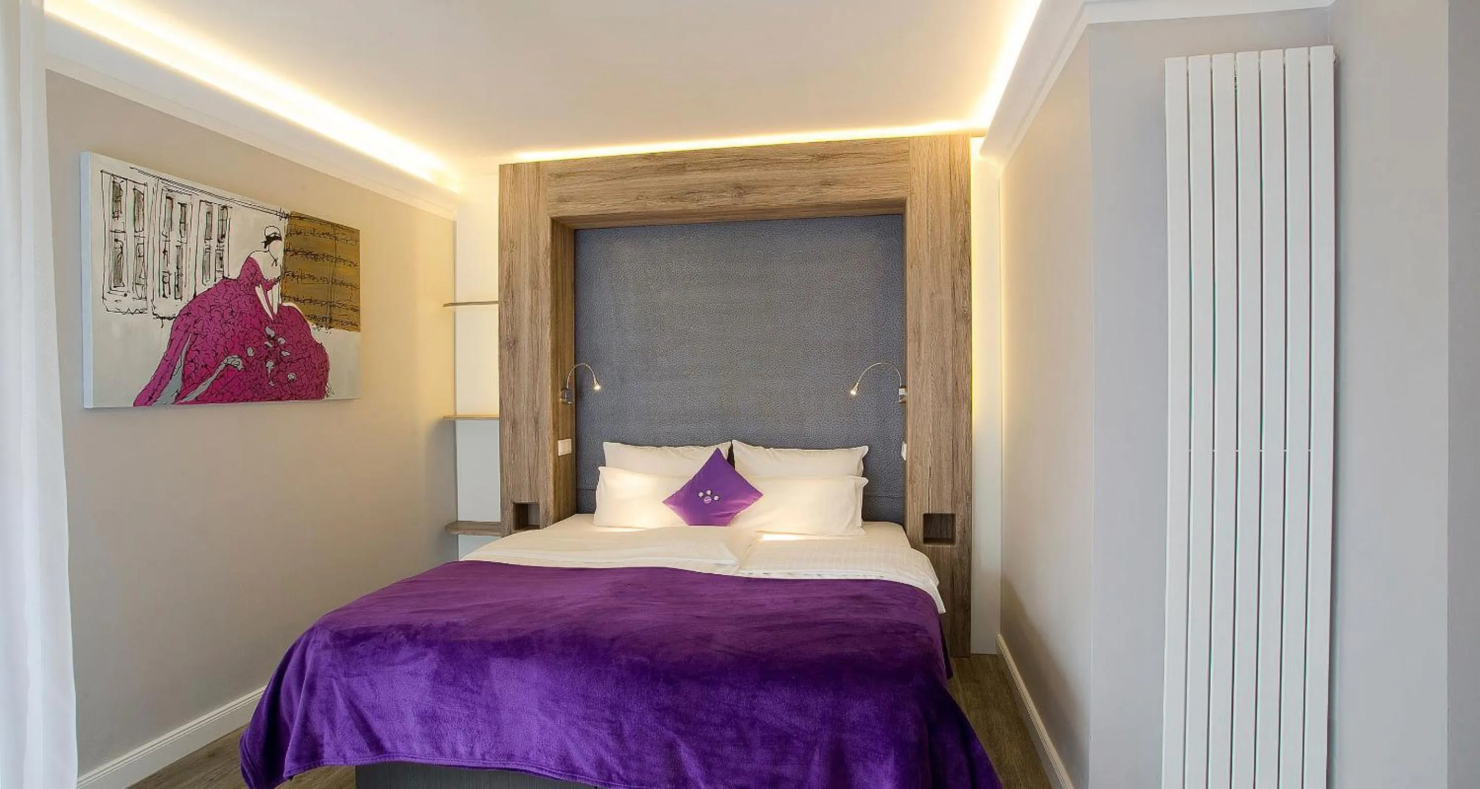 Bed in PLAZA INN stays design Dortmund