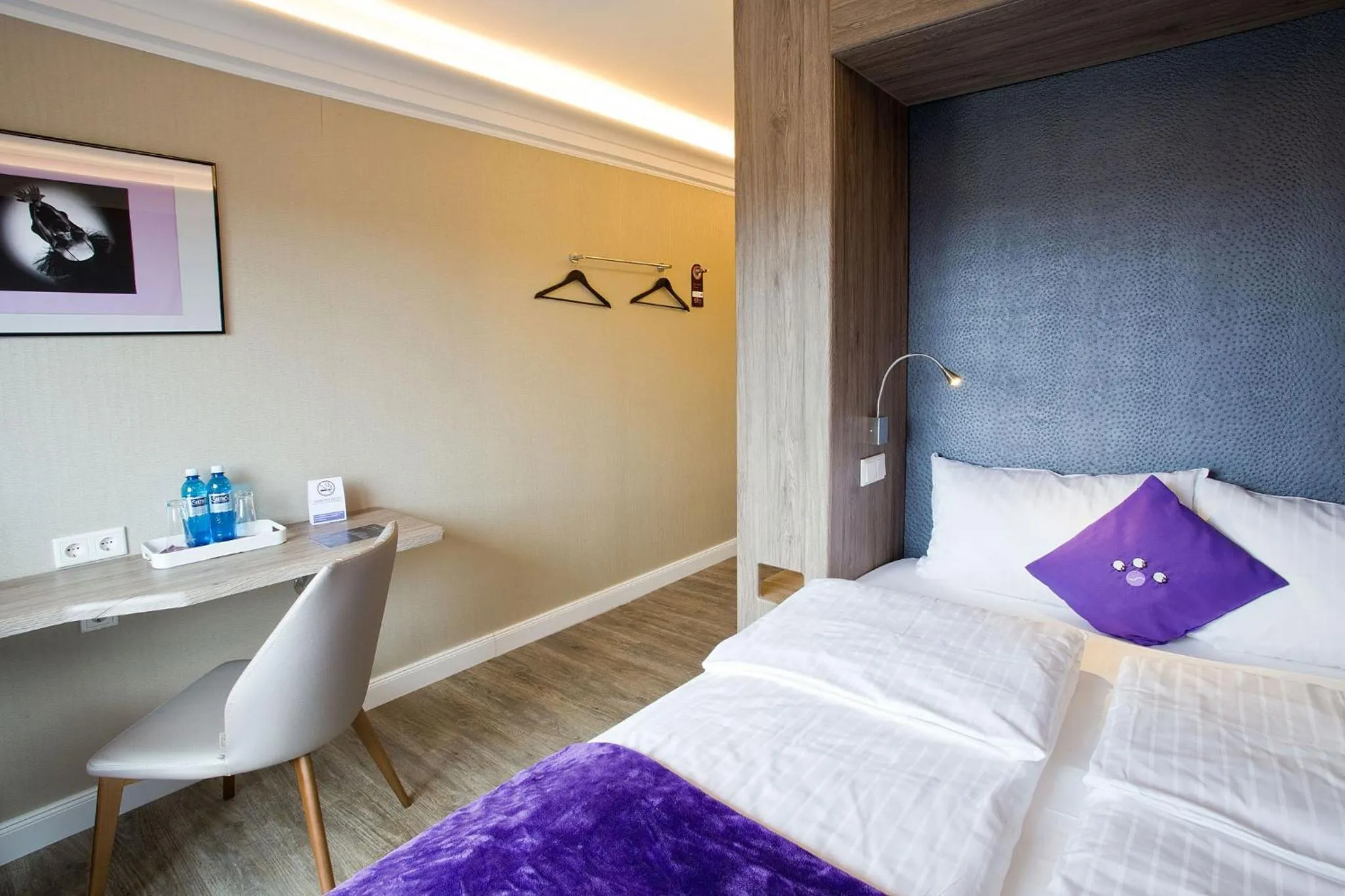 Bed in PLAZA INN stays design Dortmund