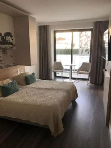 Photo of the whole room, Bed in Lagrange Apart'Hôtel Antibes Olympie