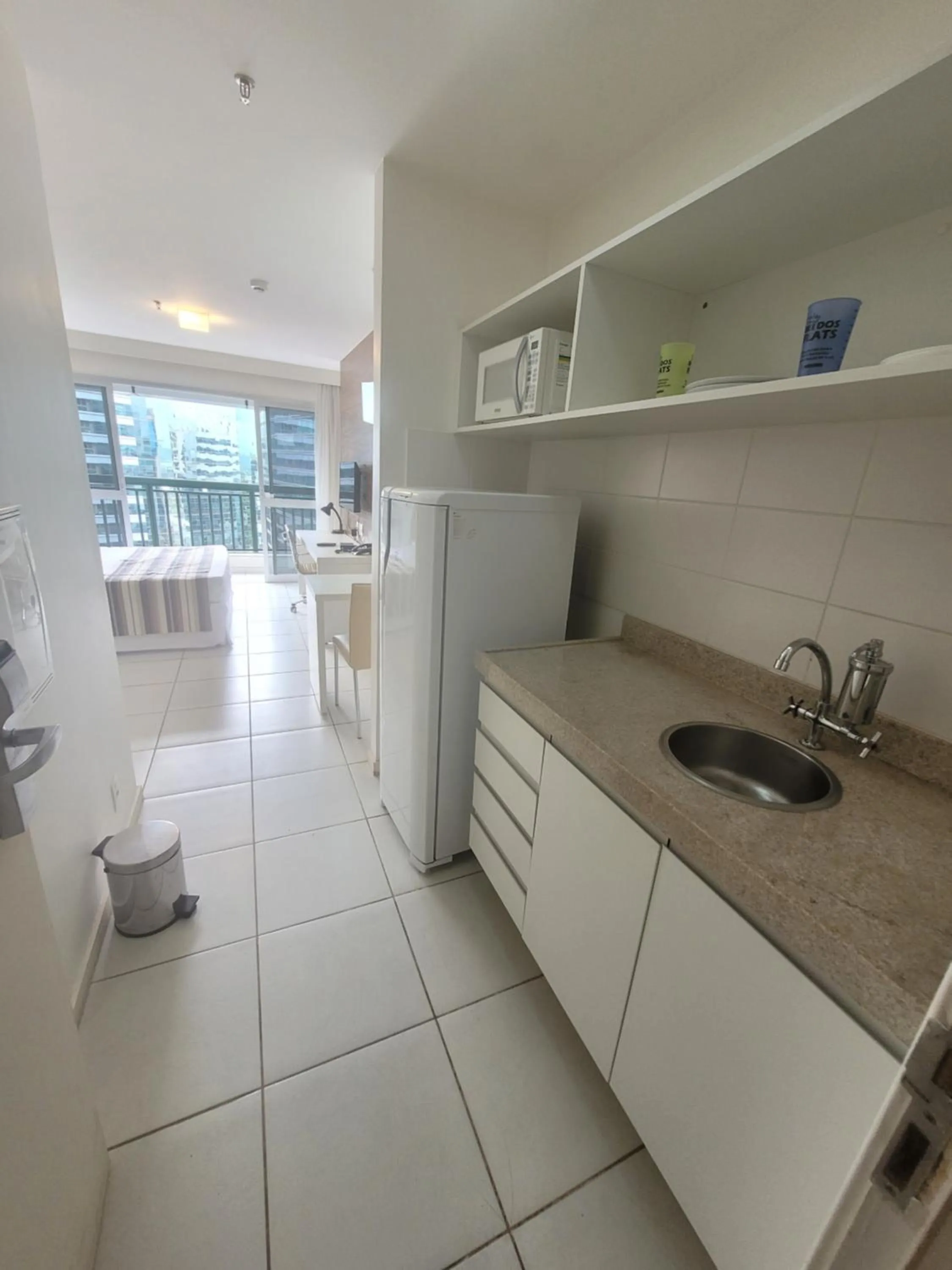 Kitchen or kitchenette in Flat Vision Executivo Premium By Rei dos Flats