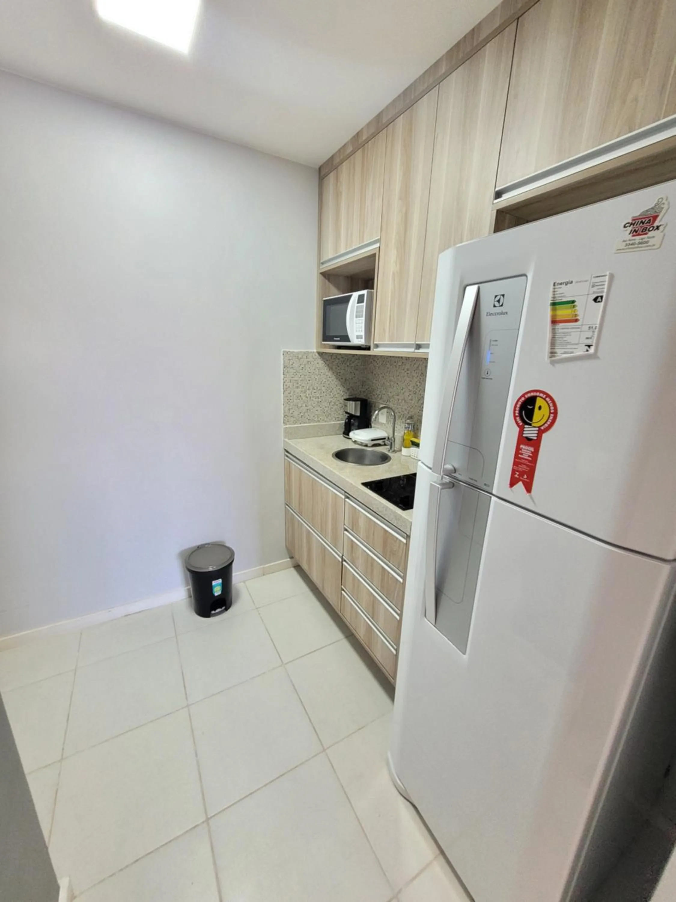 Kitchen or kitchenette in Flat Vision Executivo Premium By Rei dos Flats