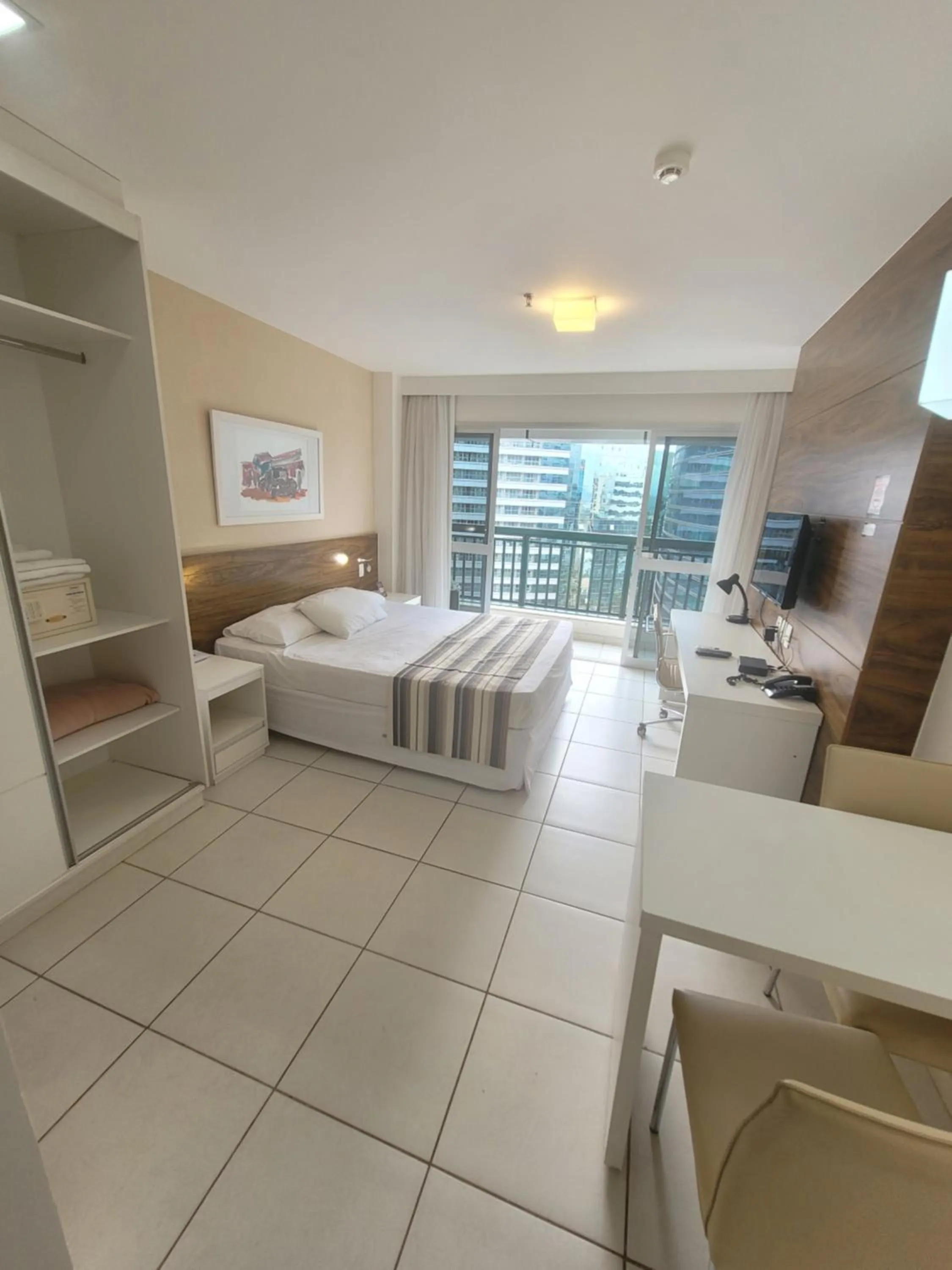 Living room, Bed in Flat Vision Executivo Premium By Rei dos Flats