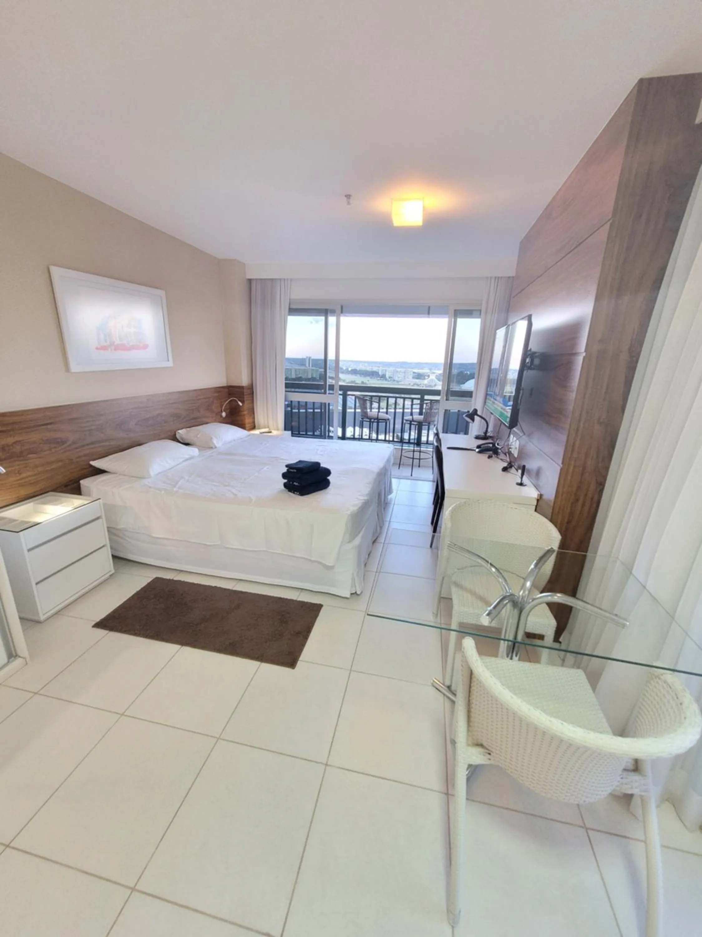 Living room, Bed in Flat Vision Executivo Premium By Rei dos Flats