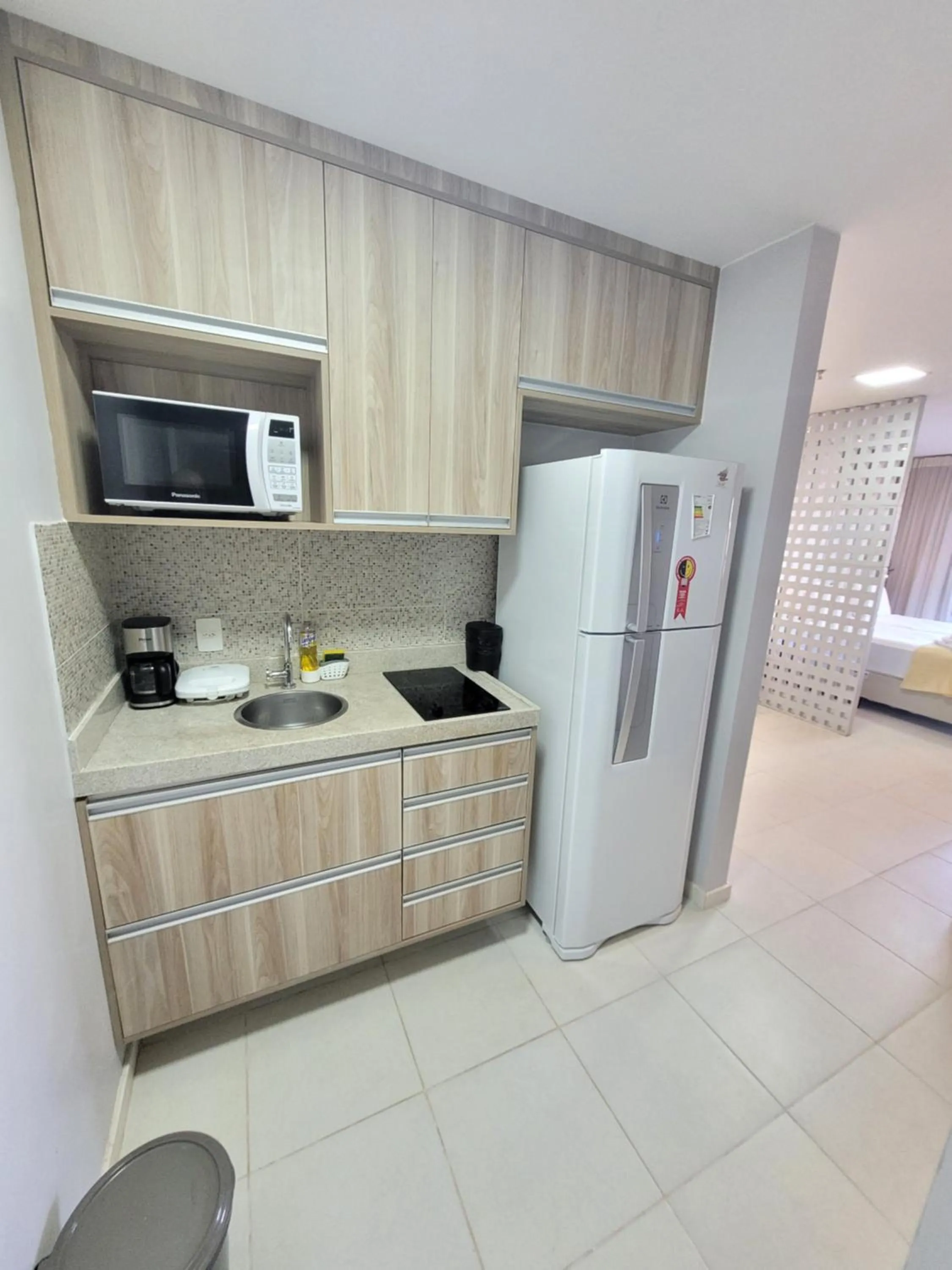 Kitchen or kitchenette in Flat Vision Executivo Premium By Rei dos Flats