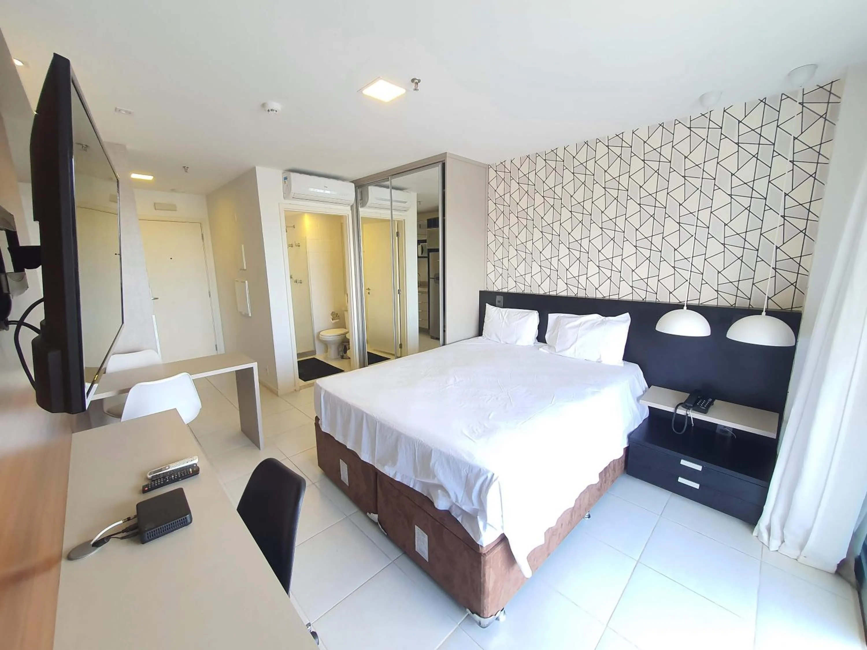 Communal lounge/ TV room, Bed in Flat Vision Executivo Premium By Rei dos Flats