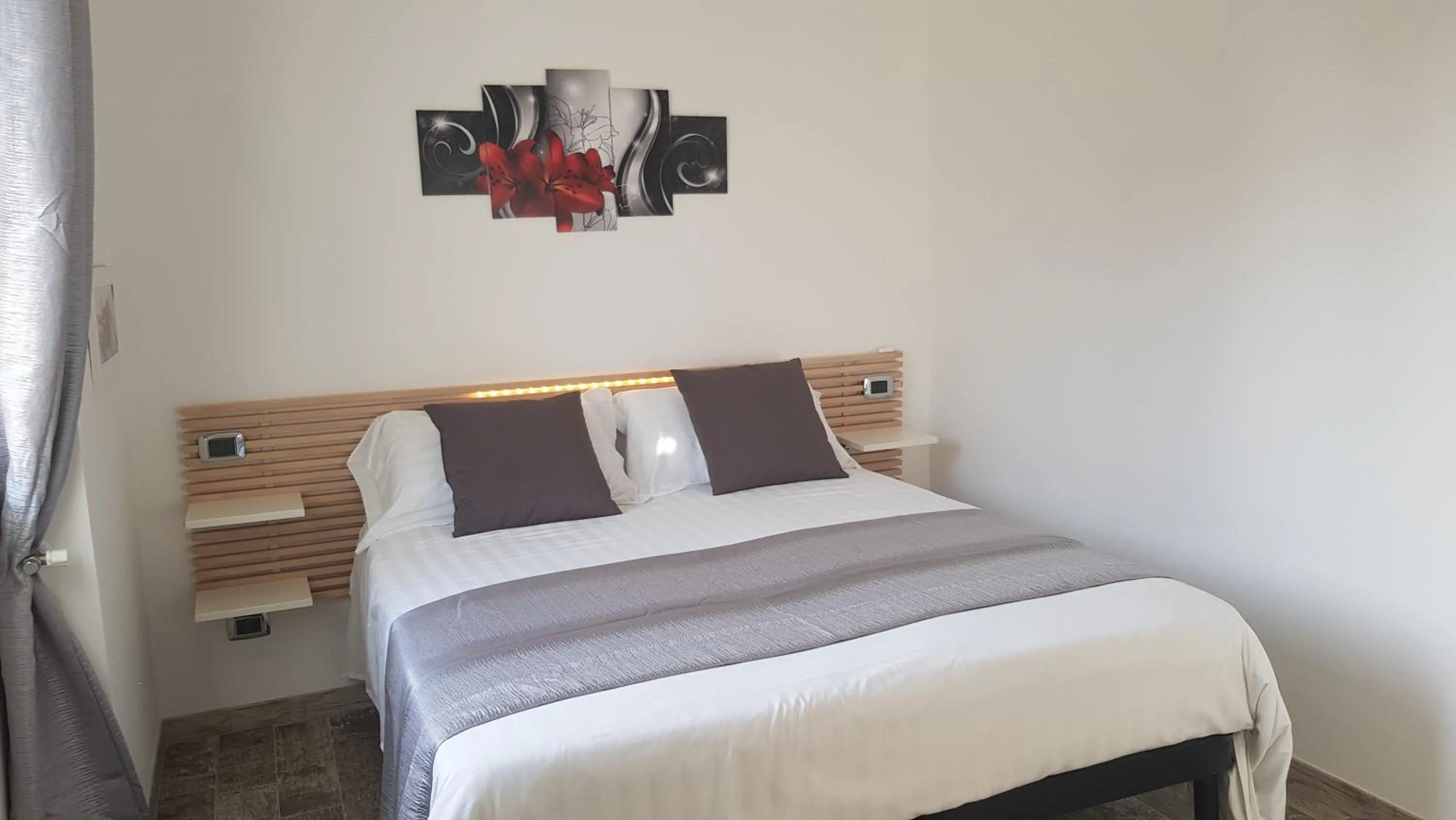 Bed in THAT'S AMORE FIUMICINO Airport