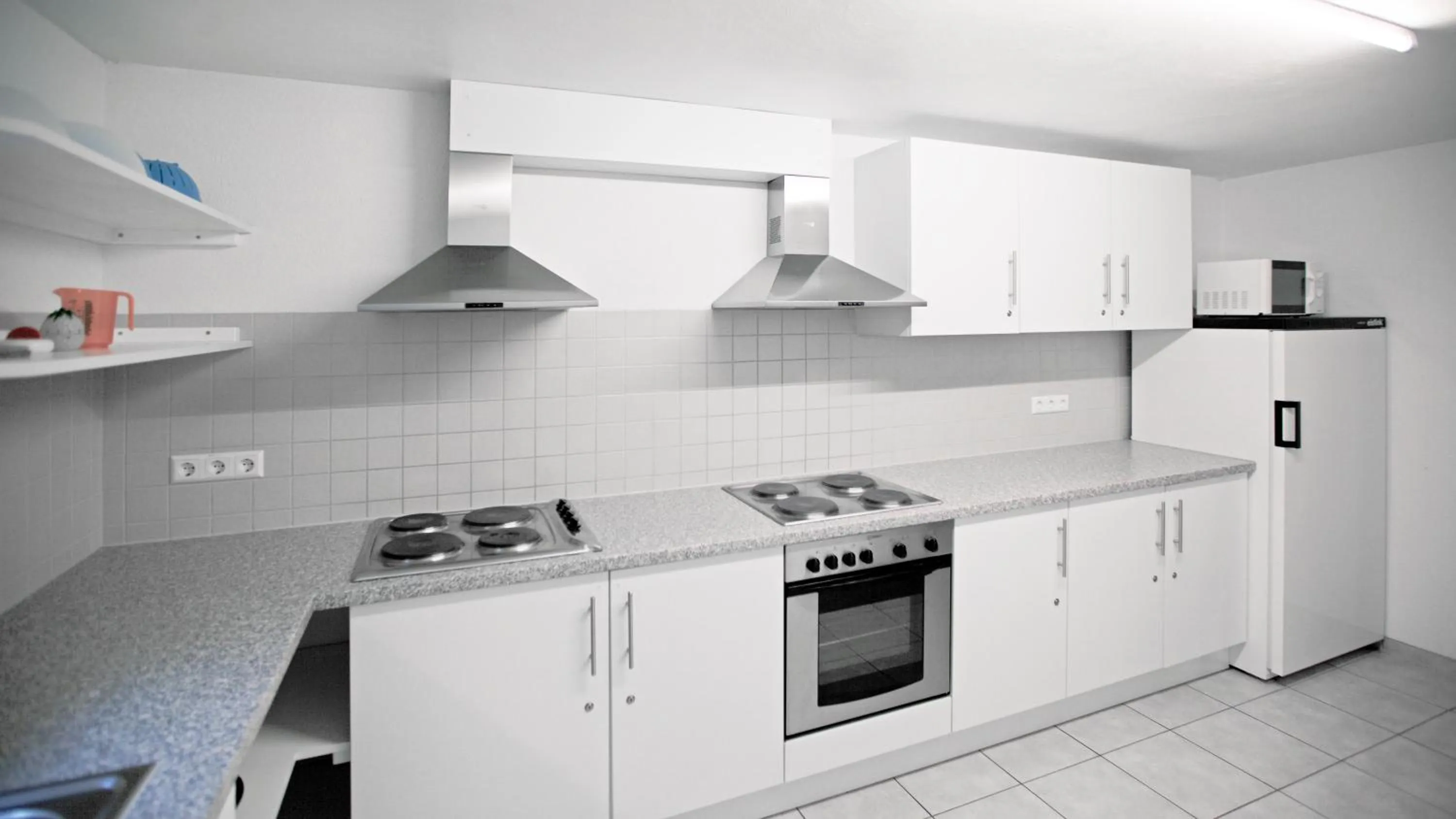 Communal kitchen in Hotel Victoria