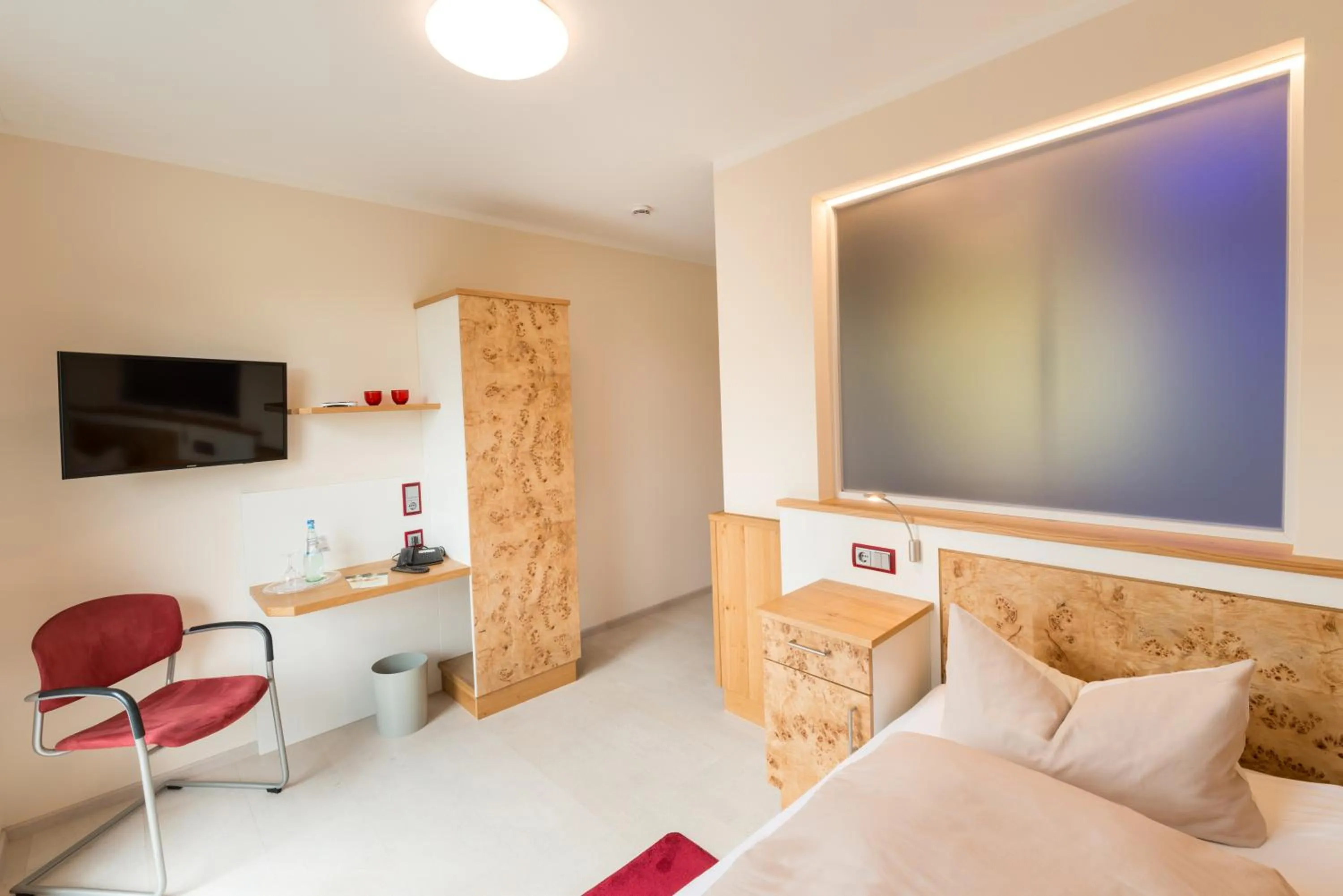 Photo of the whole room, Bed in Hotel Luisen Mühle