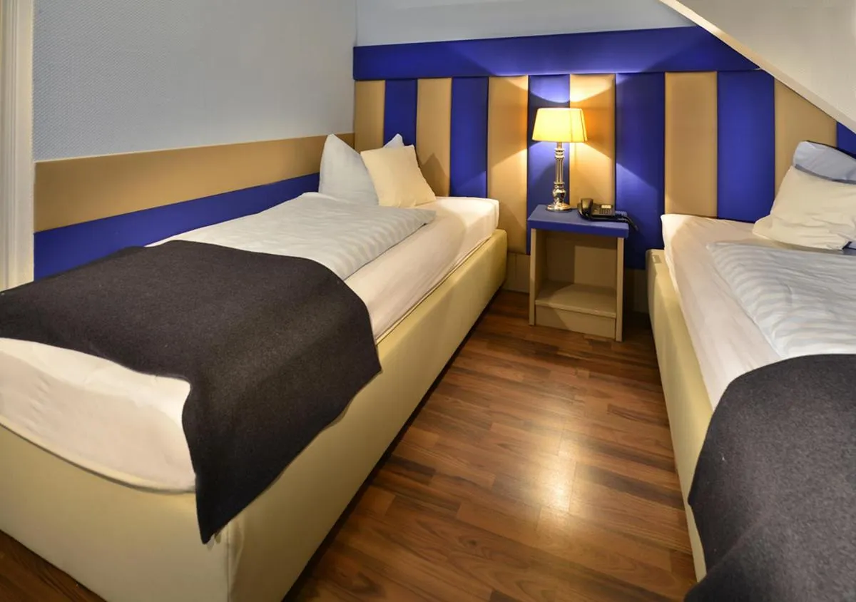 Photo of the whole room, Bed in Hotel Am Wehrhahn