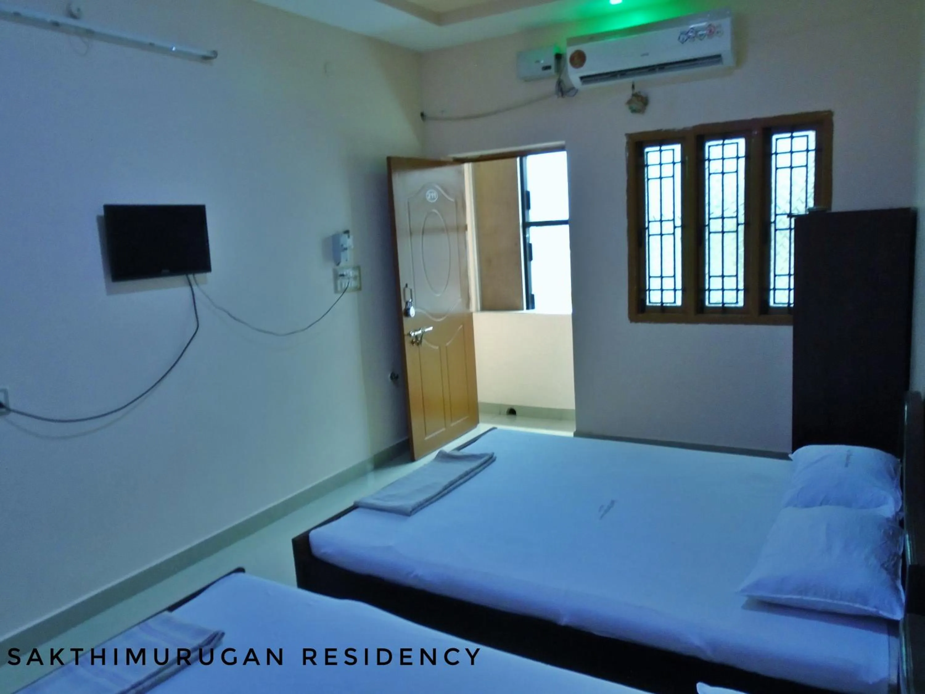 Bedroom, Bed in Sakthimurugan residency