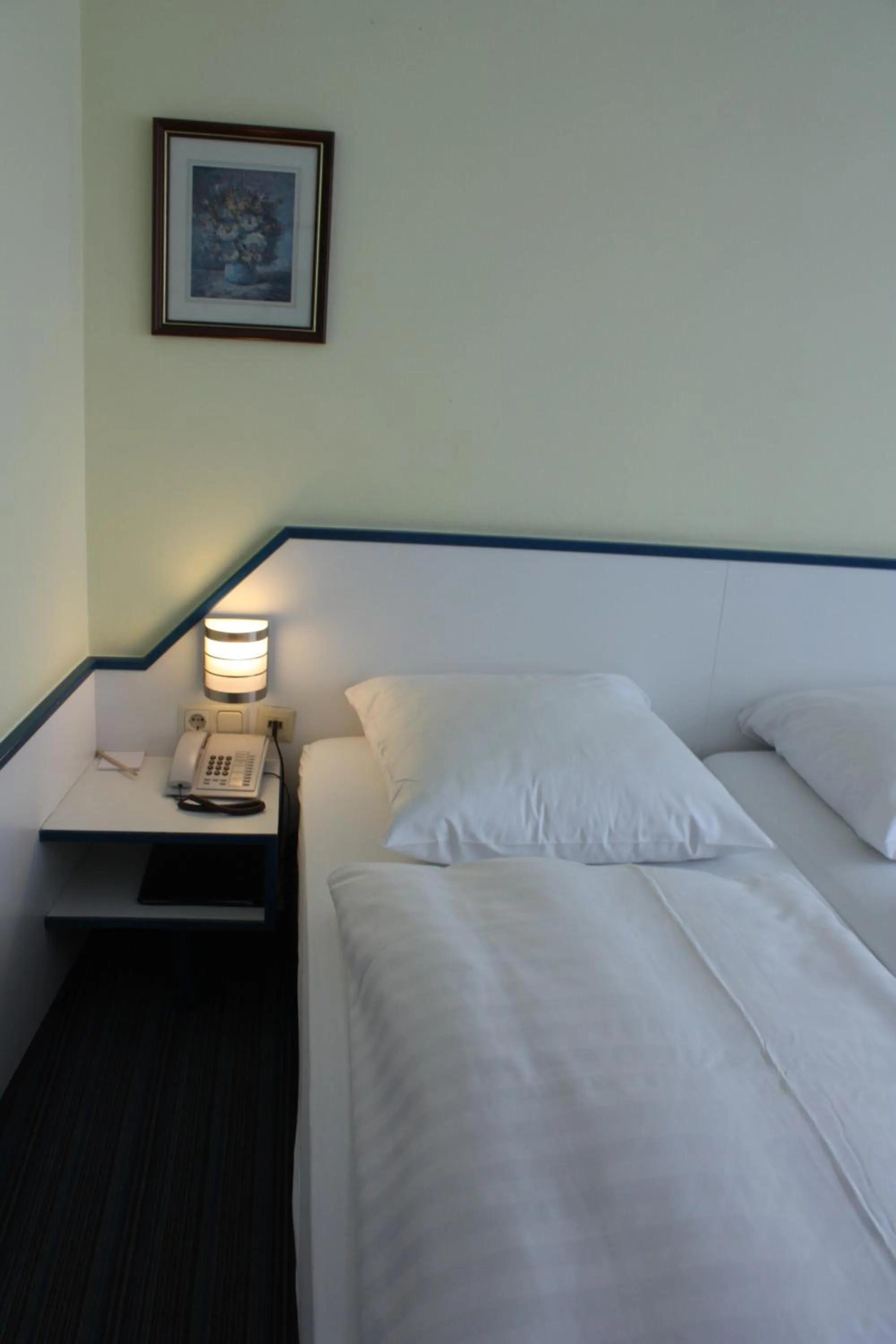 Bed in Hotel City Kräme am Römer - Self Check In