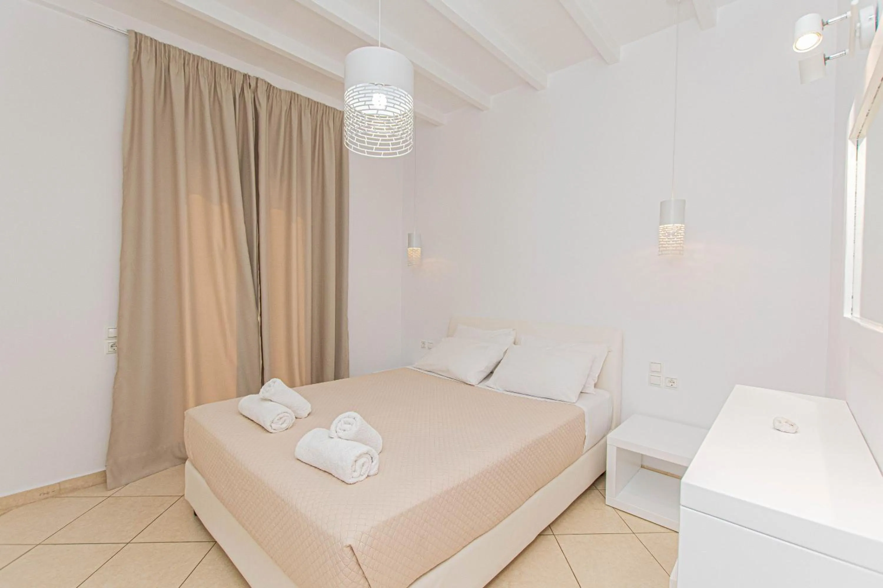 Bedroom in Overview Mykonos Apartments