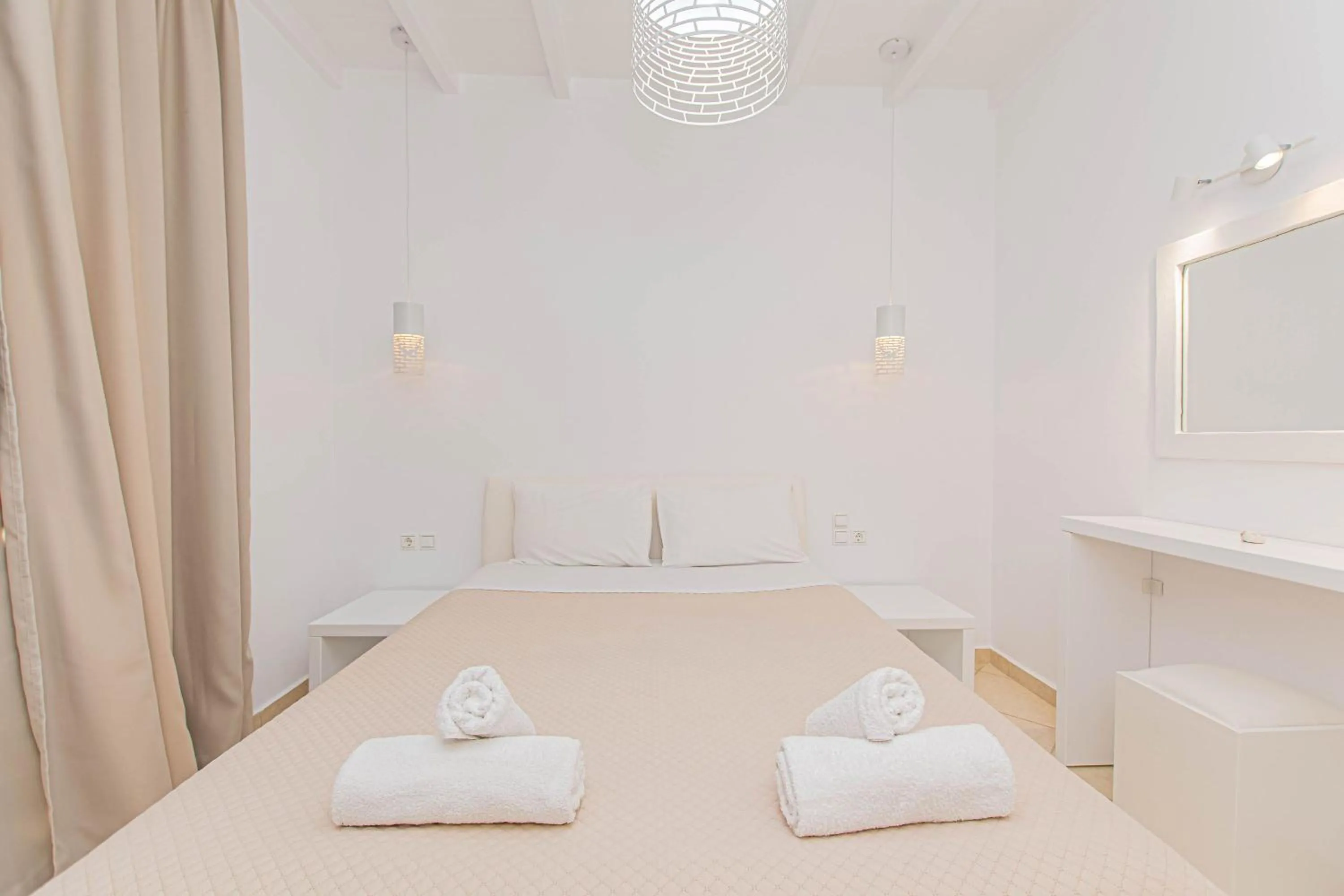 Bedroom in Overview Mykonos Apartments