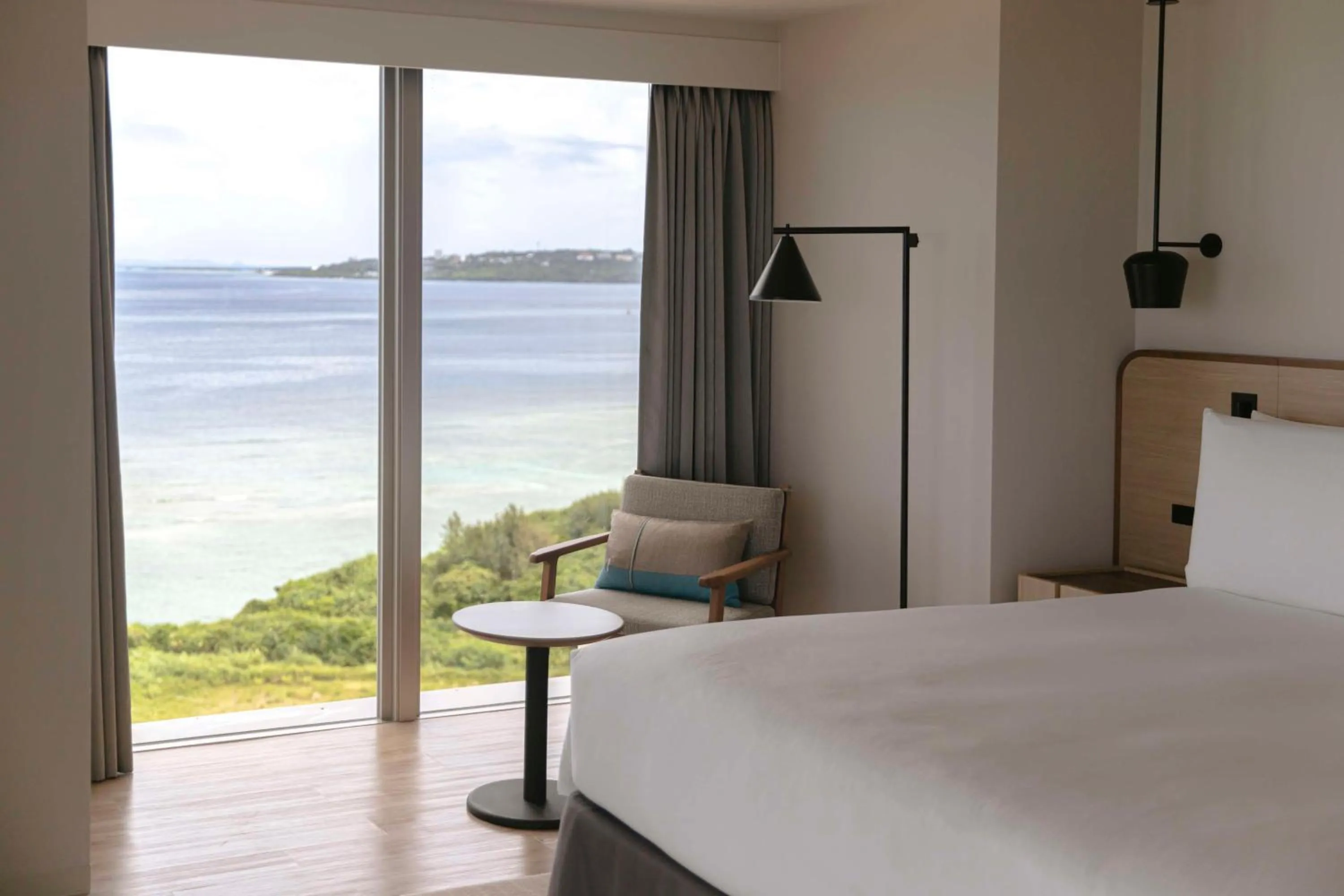 View (from property/room), Bed in Hilton Okinawa Sesoko Resort