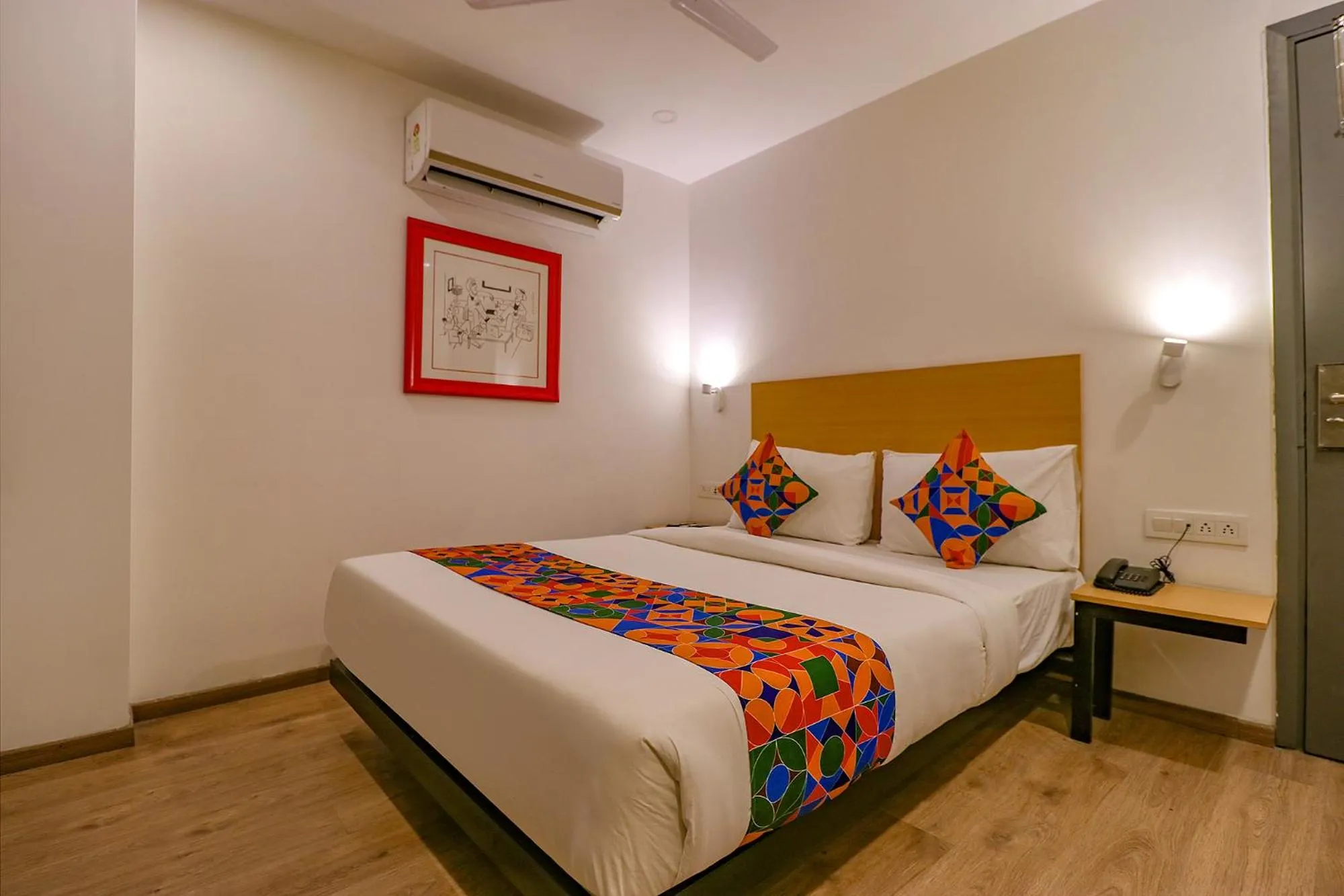 Bed in FabHotel Hargobind Enclave