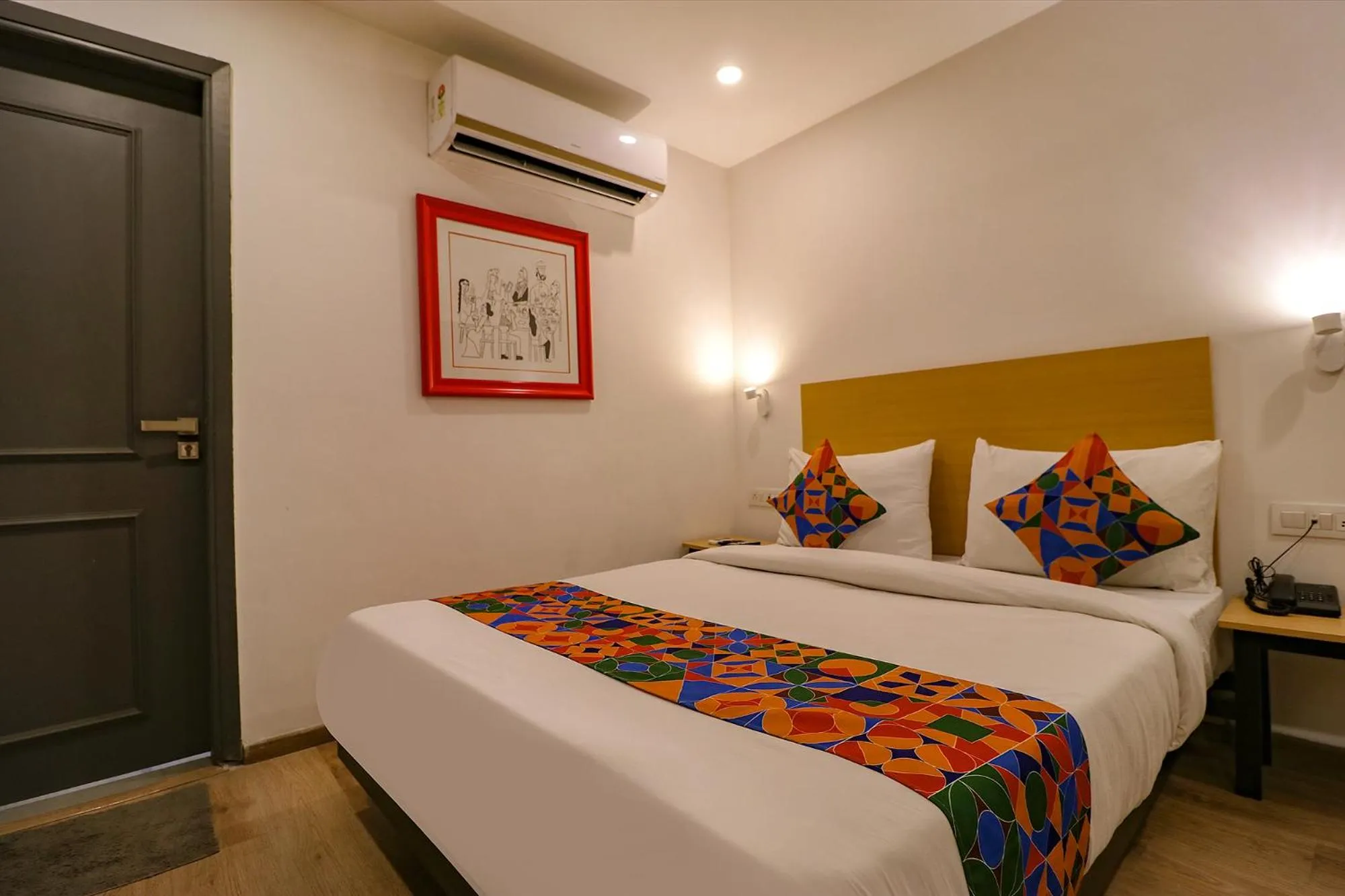 Bed in FabHotel Hargobind Enclave