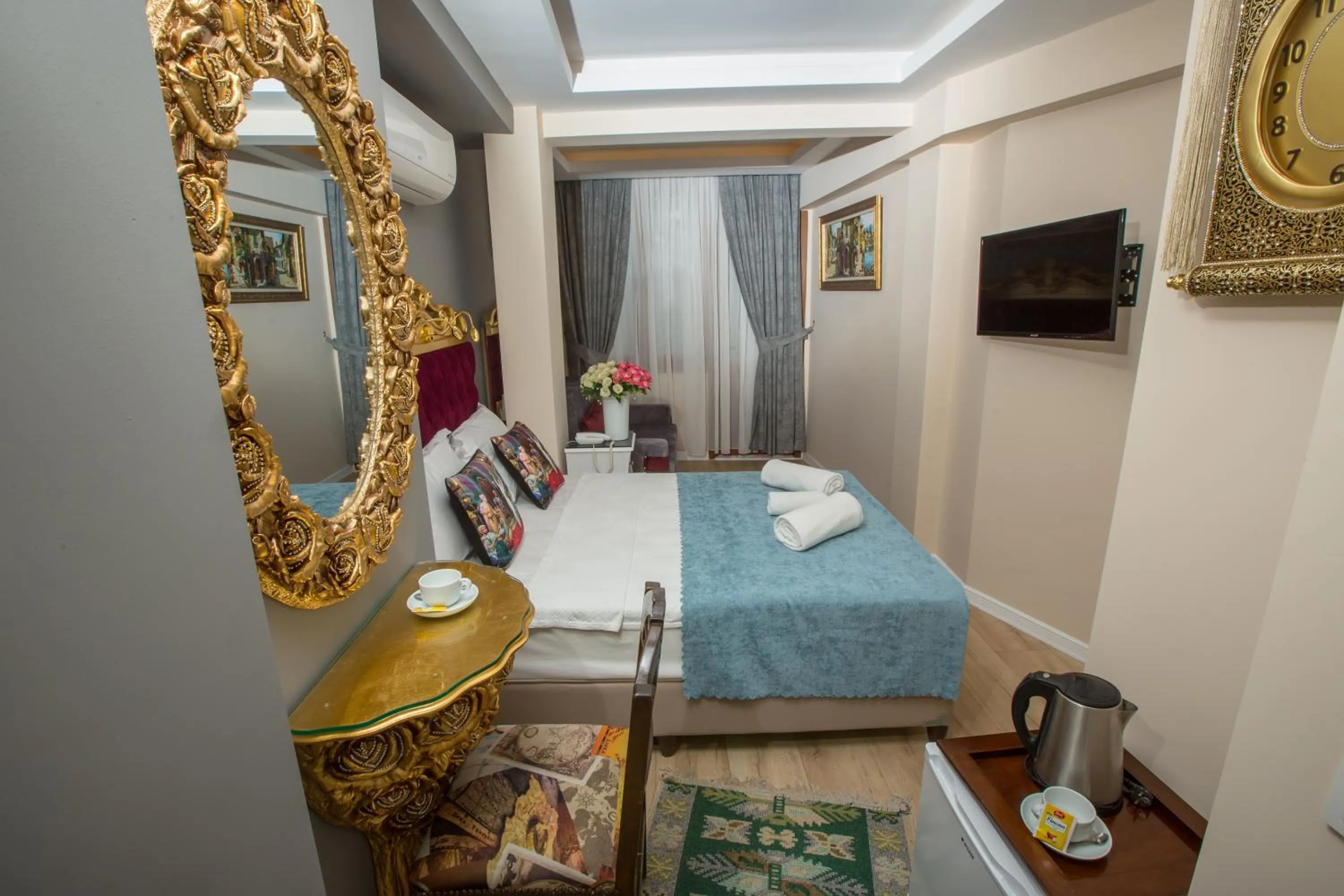 Bed in Atlantis Royal Hotel