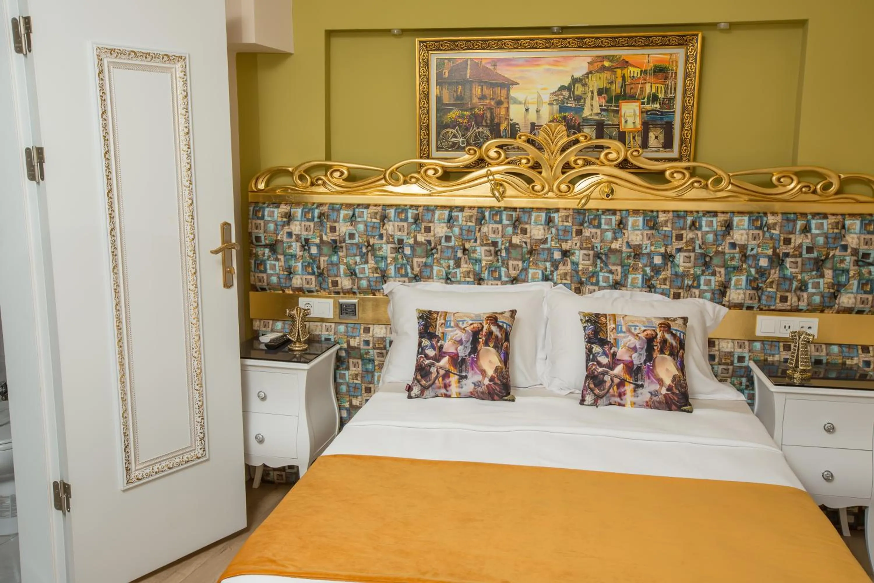 Bed in Atlantis Royal Hotel