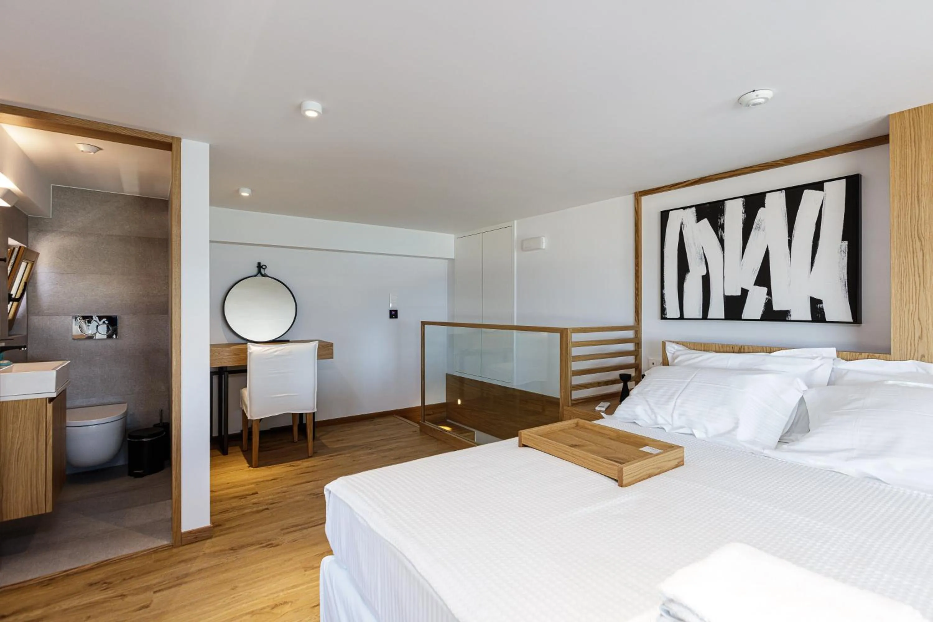 Bed in North Coast Seaside Suites