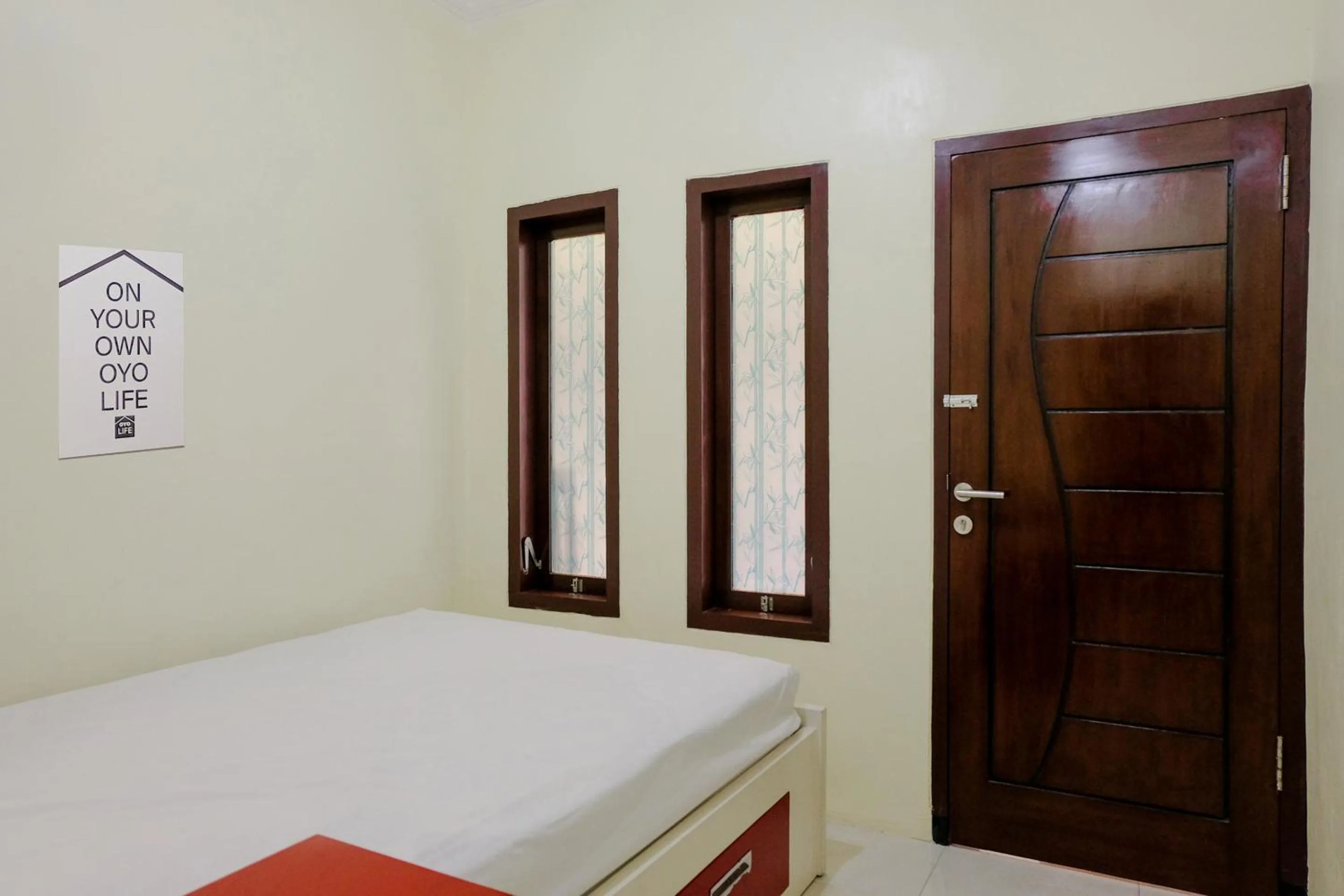 Bed in Zulfina Homestay Syariah Mitra RedDoorz