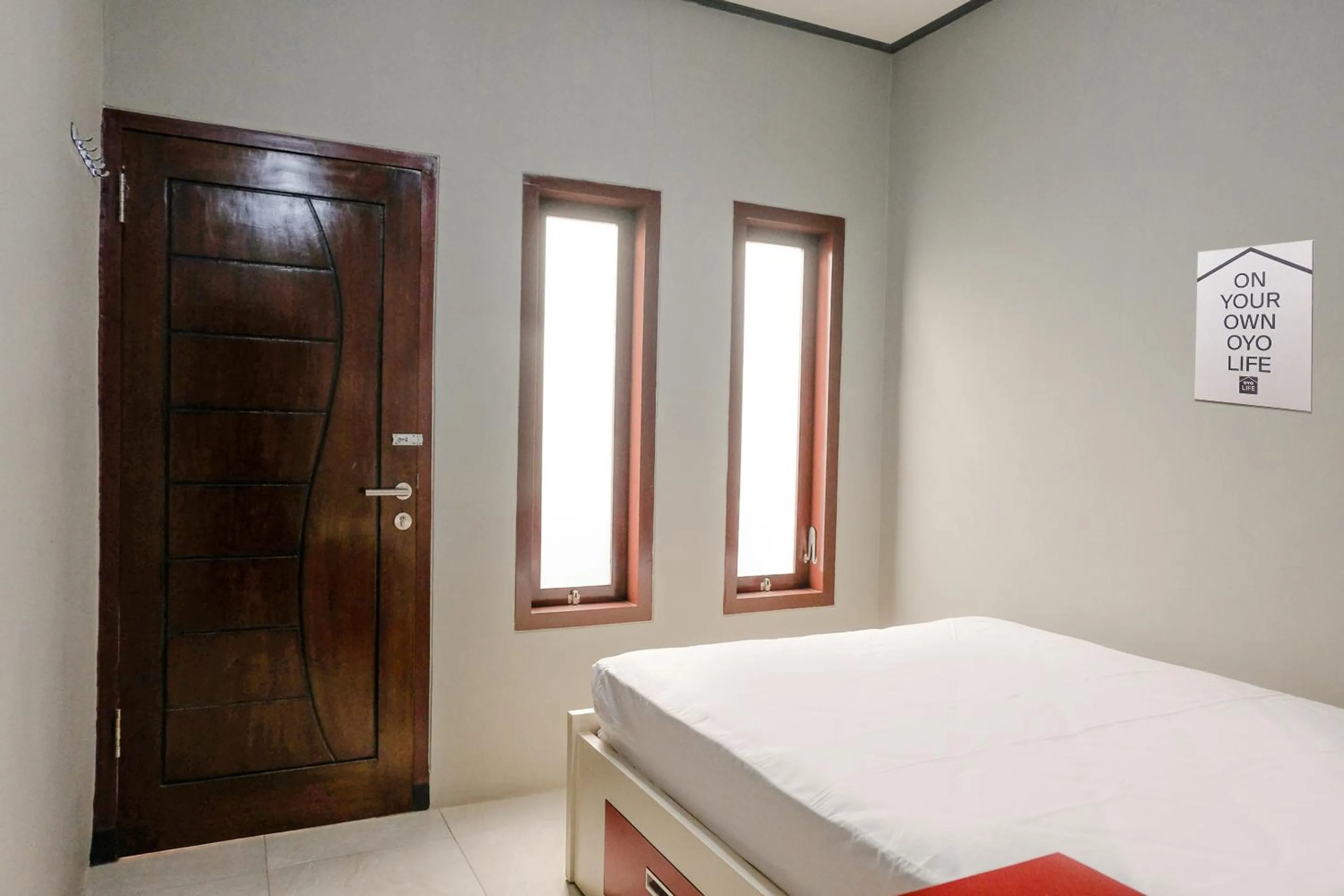Bed in Zulfina Homestay Syariah Mitra RedDoorz