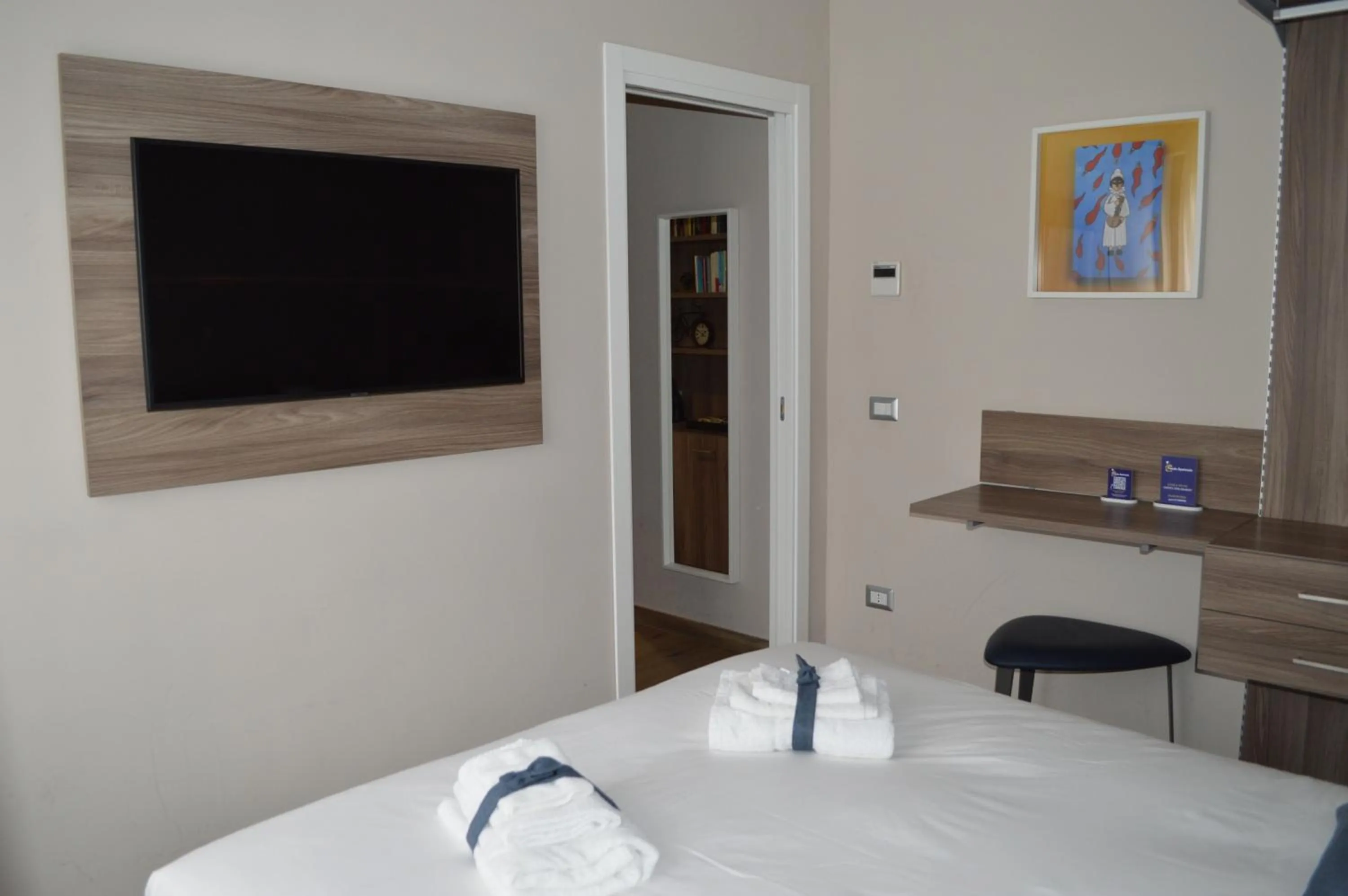 TV and multimedia, Bed in Famalu apartments