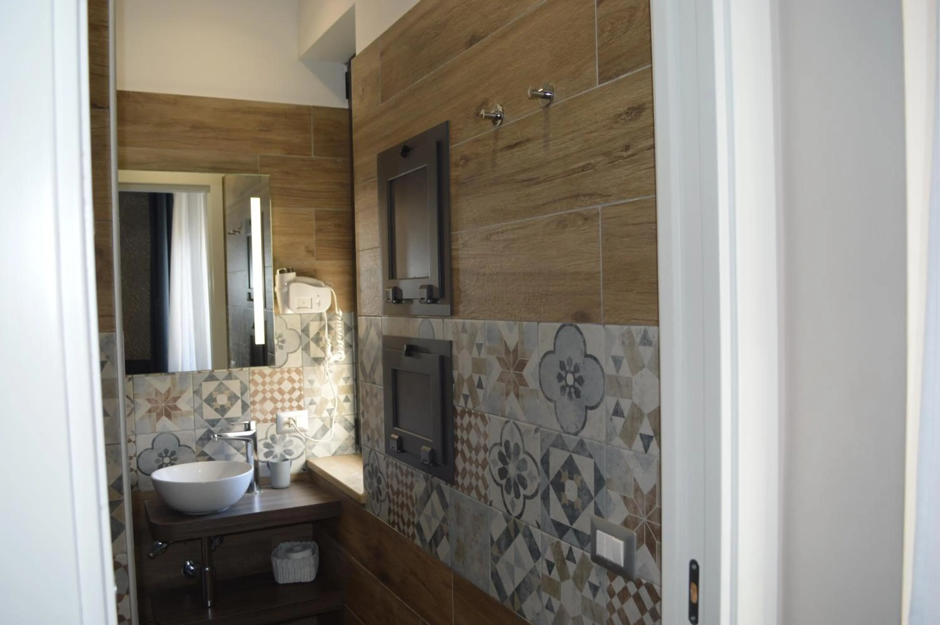 Bathroom in Famalu apartments