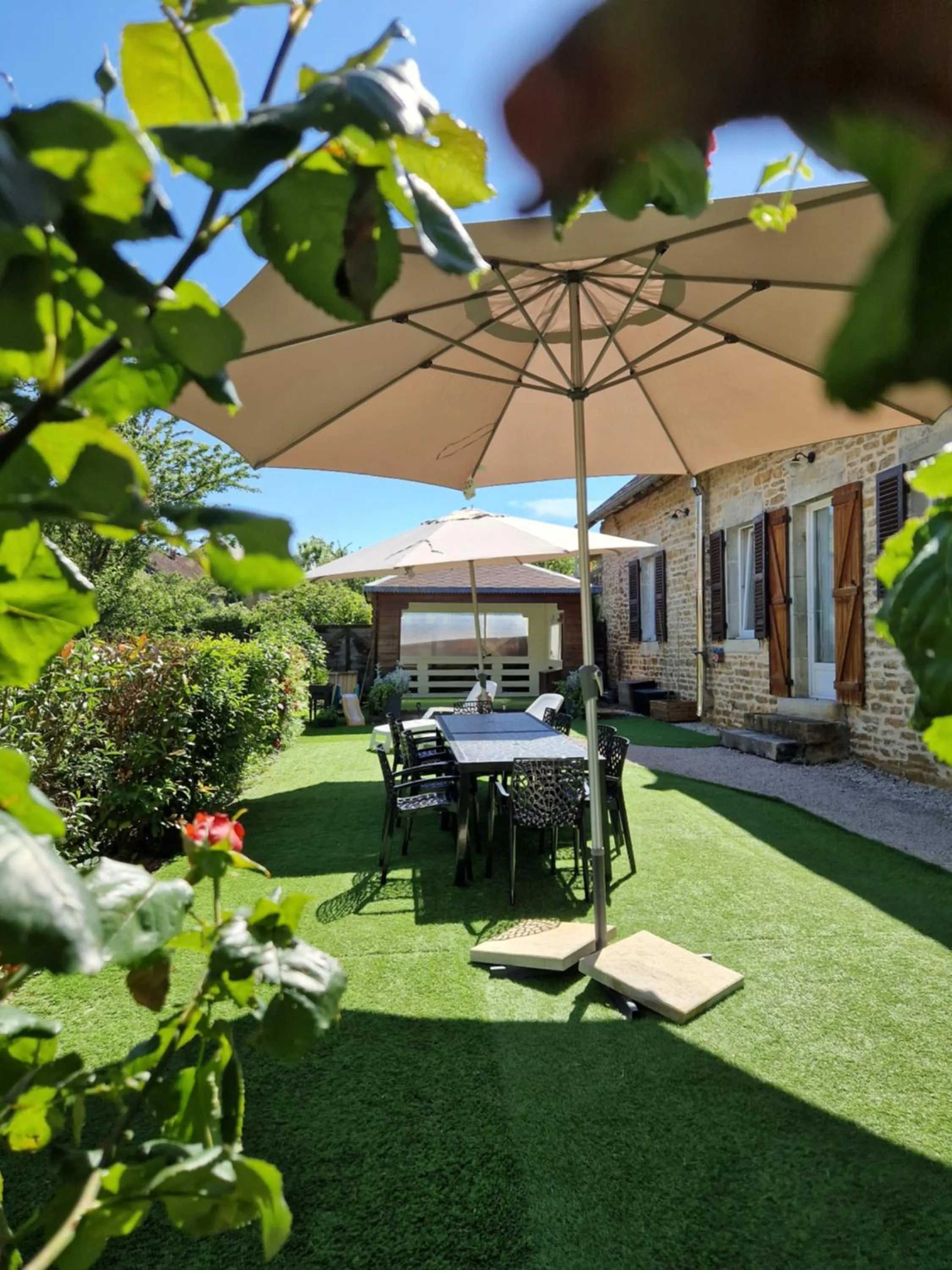 Garden in Chambres d'hôtes Une autre maison
