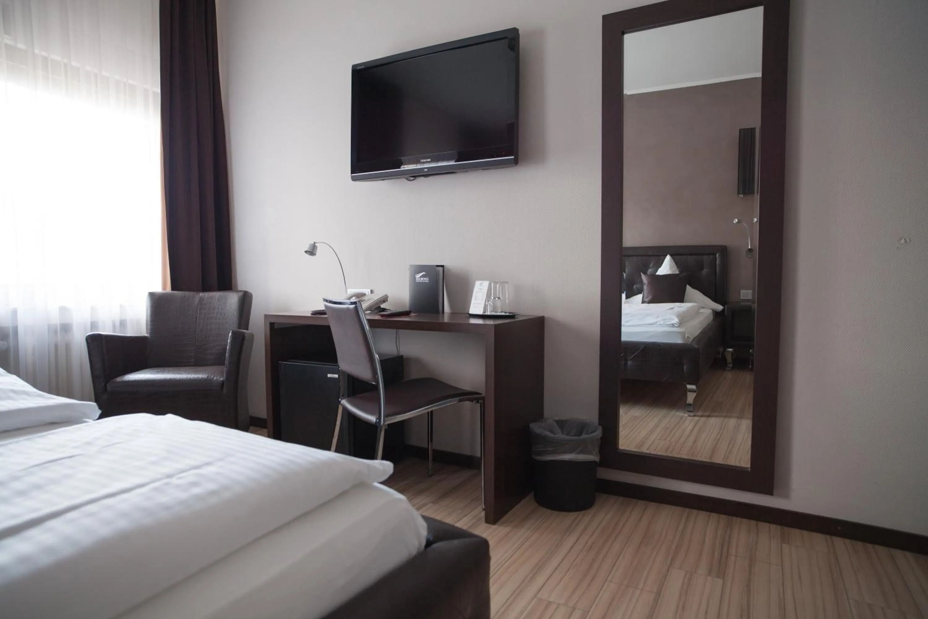 TV and multimedia, Bed in Mauritius Komfort Hotel in der Altstadt