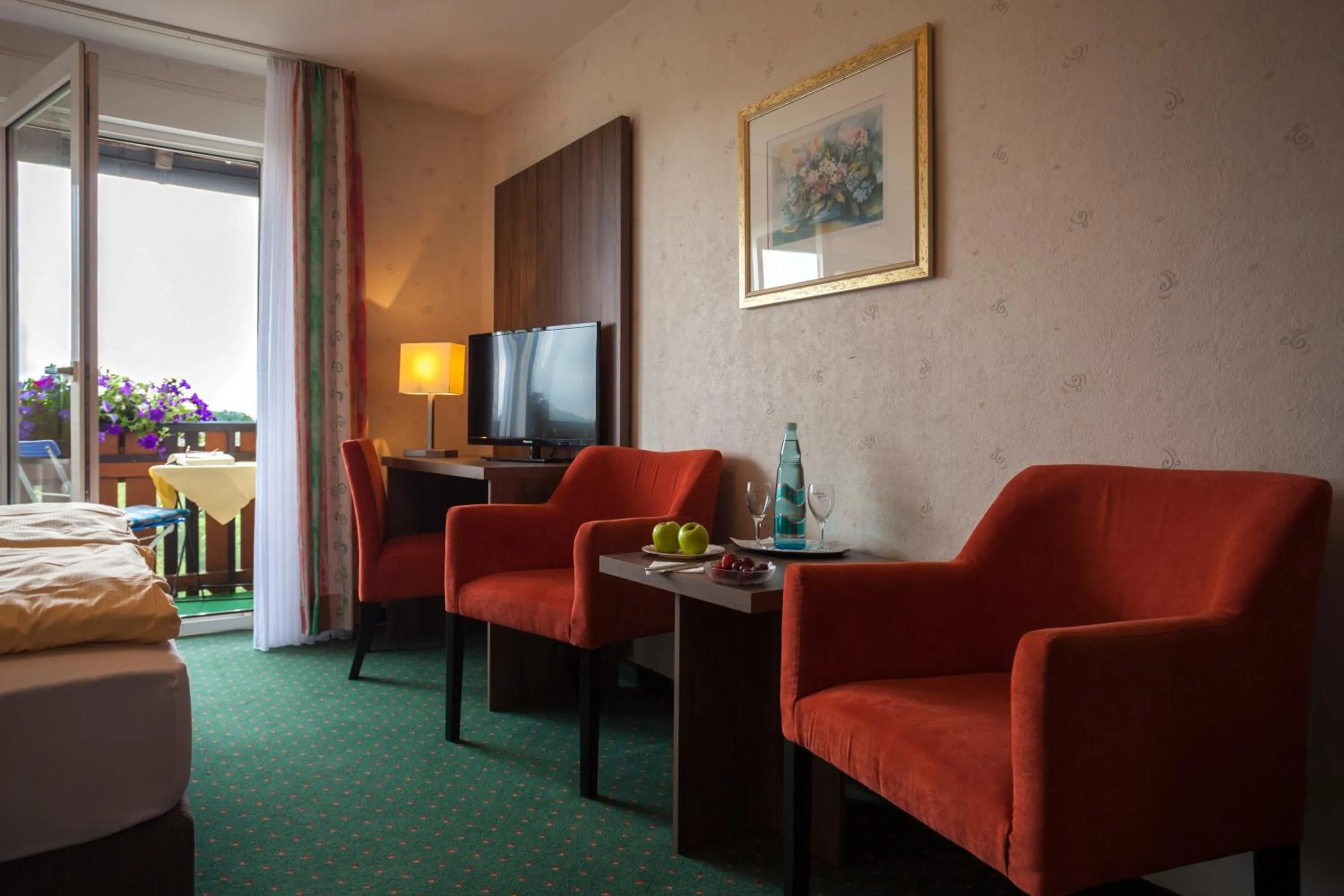 Seating area, Bed in Hotel Berghof