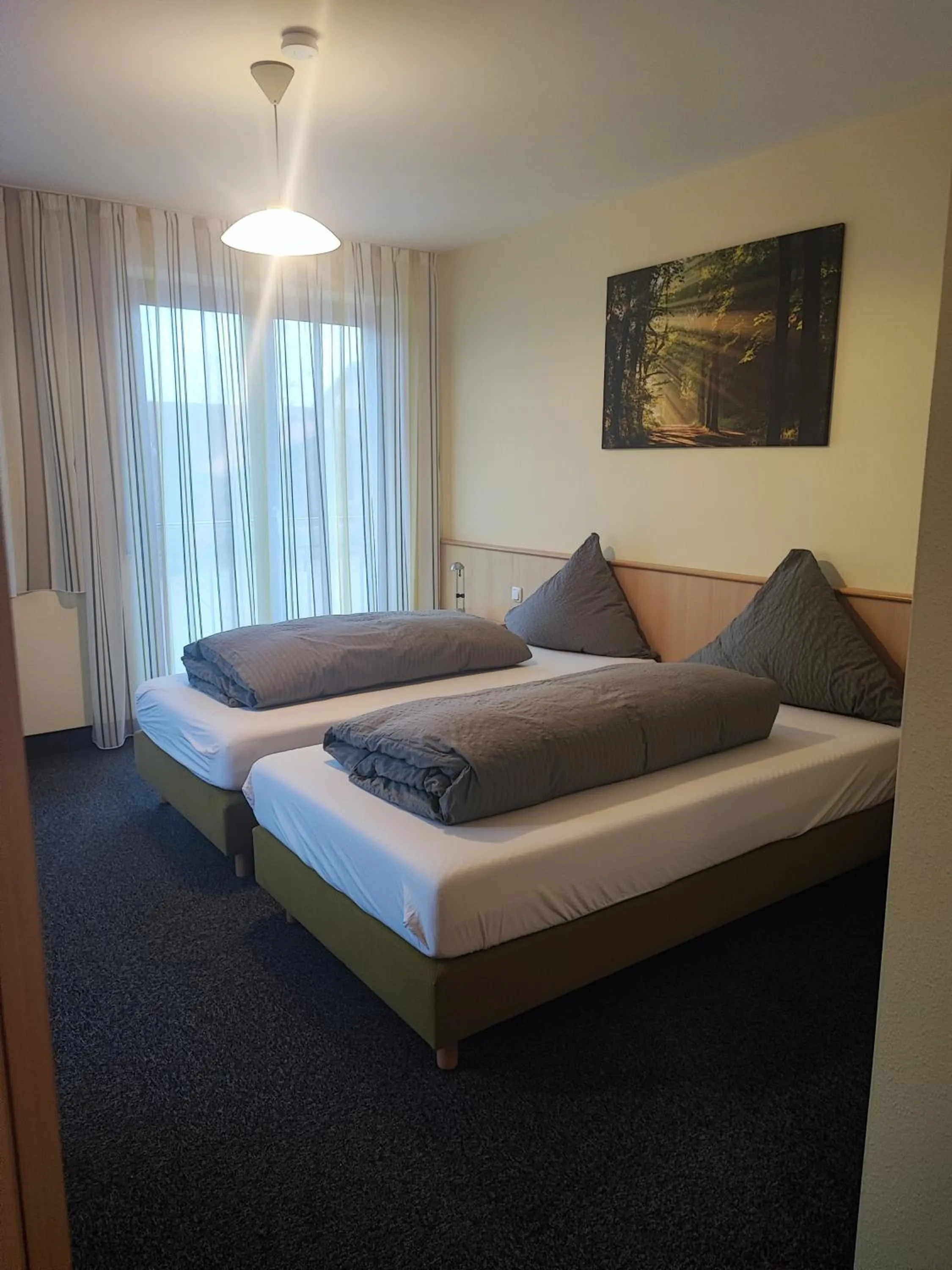 Photo of the whole room, Bed in Wirtshaus Zur Bina