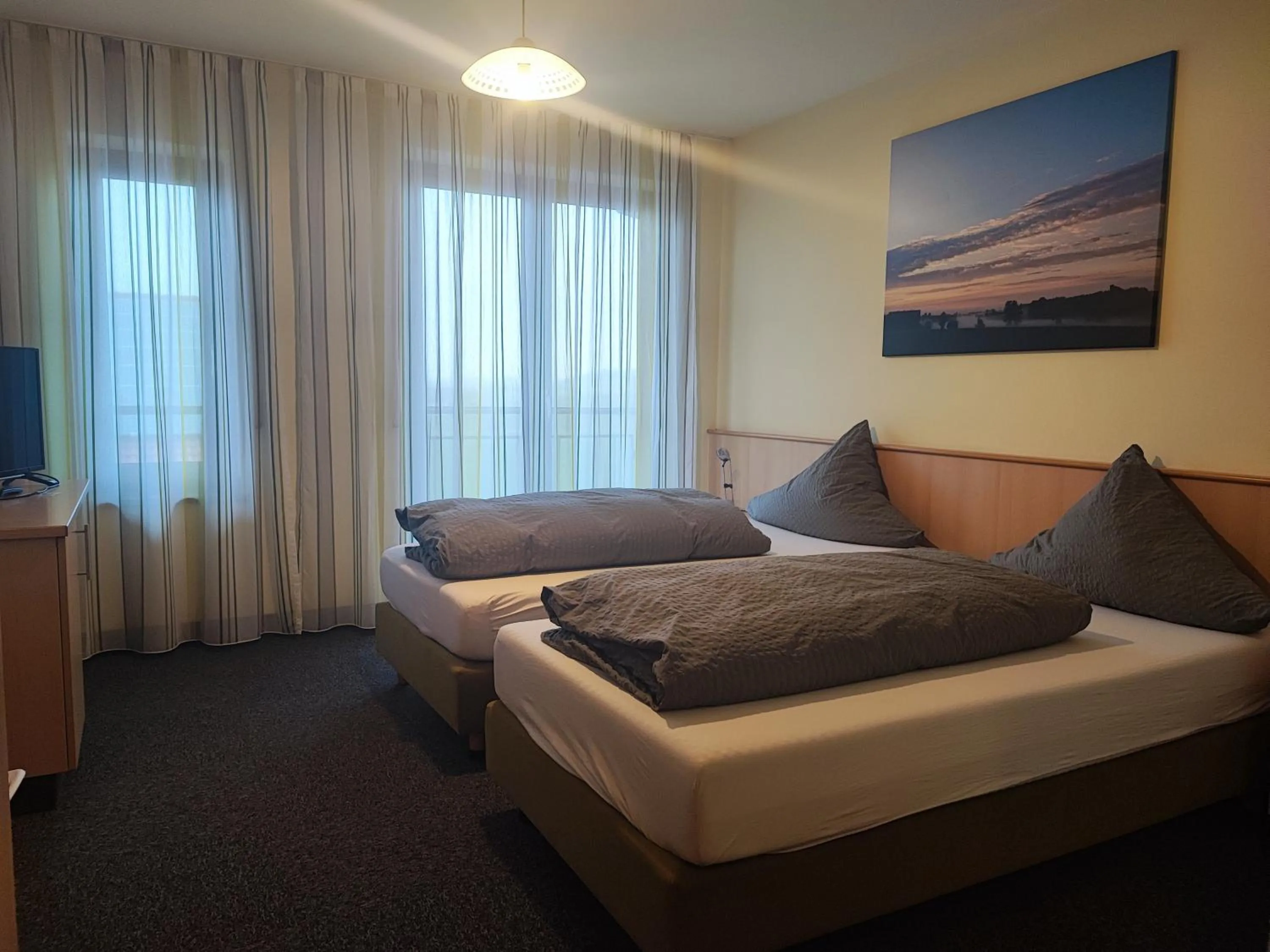 Photo of the whole room, Bed in Wirtshaus Zur Bina