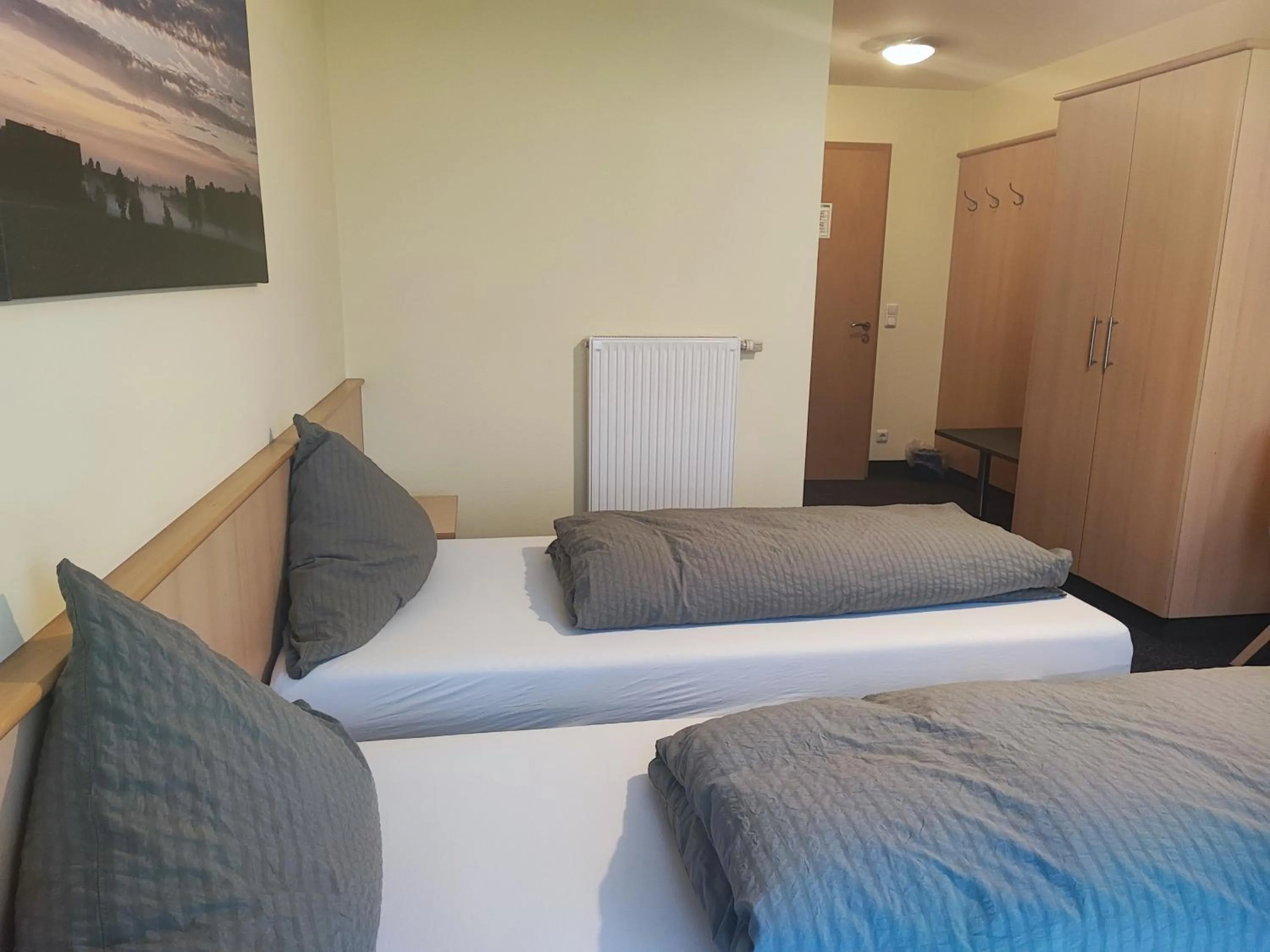 Photo of the whole room, Bed in Wirtshaus Zur Bina