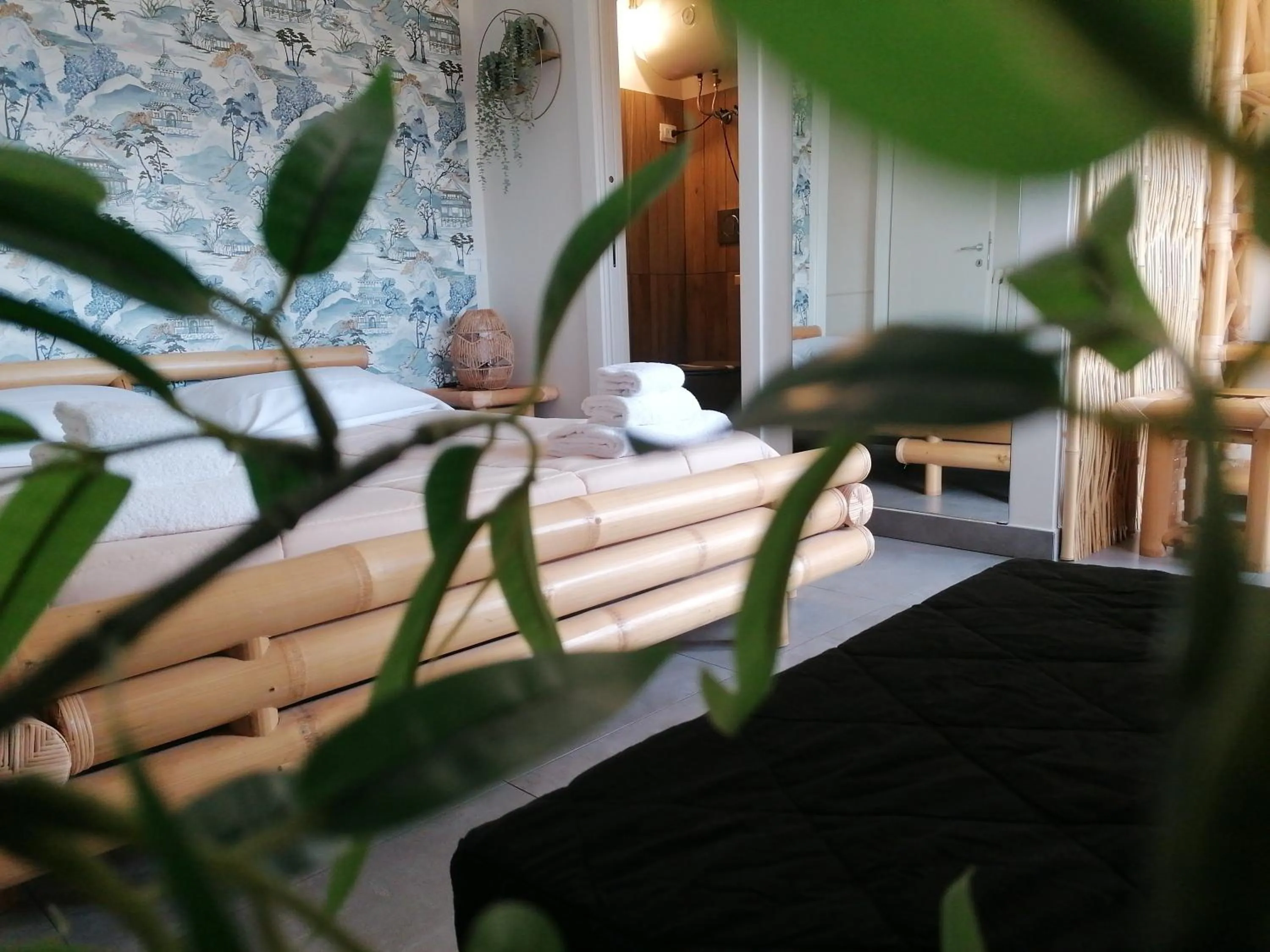 Bed in Le Boutique Luxury Rooms diffused in Historic Center