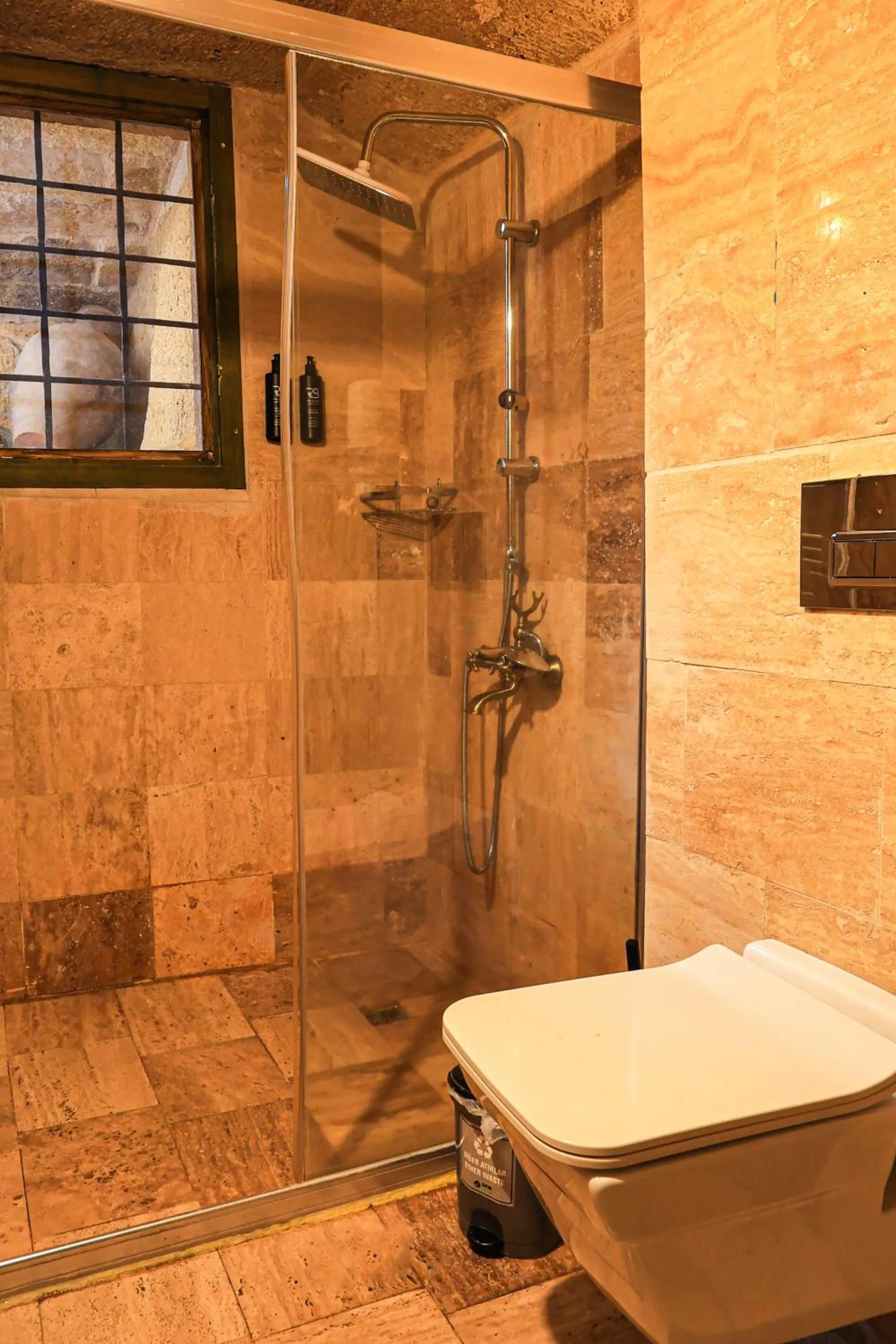 Shower in Casia Cave Suites