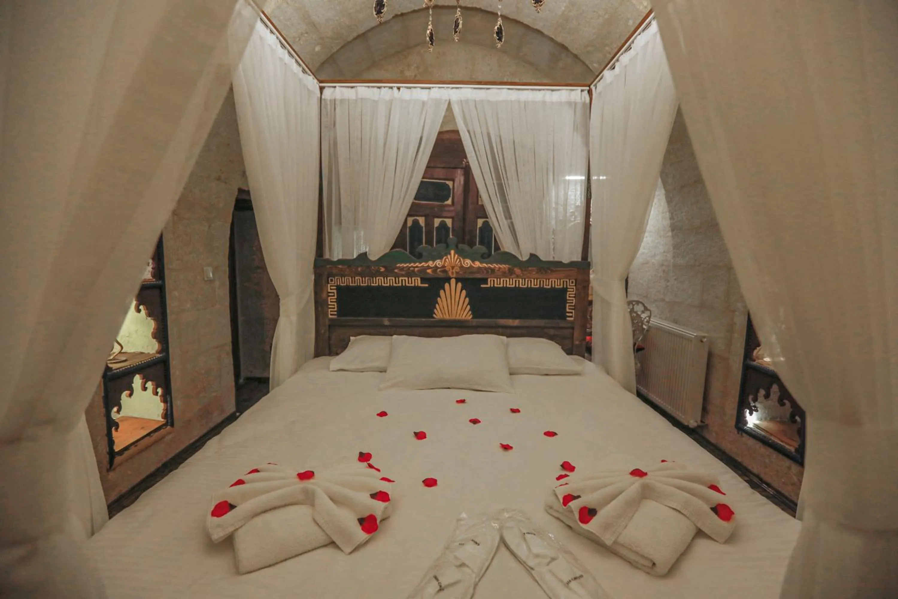 Bed in Casia Cave Suites
