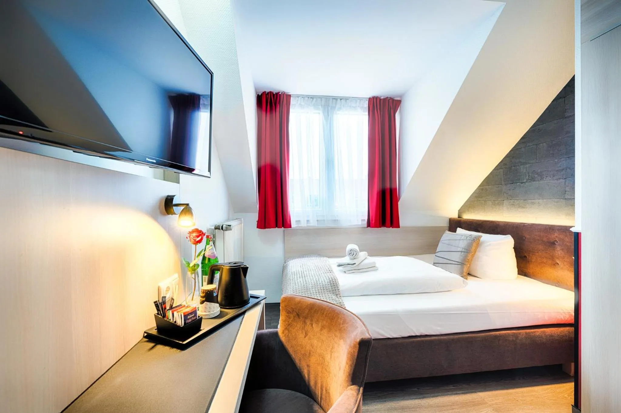 Photo of the whole room, Bed in Home Hotel