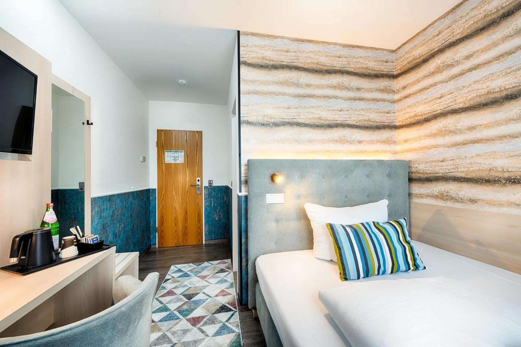 Photo of the whole room, Bed in Home Hotel