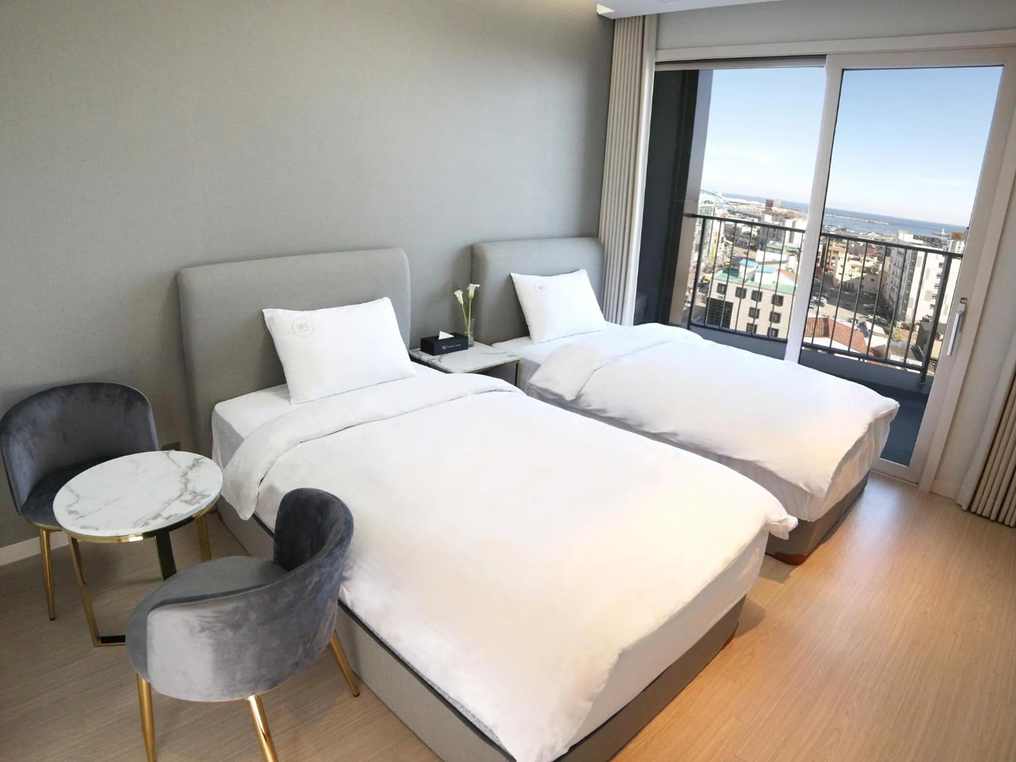 Bed in World State Hotel Sokcho