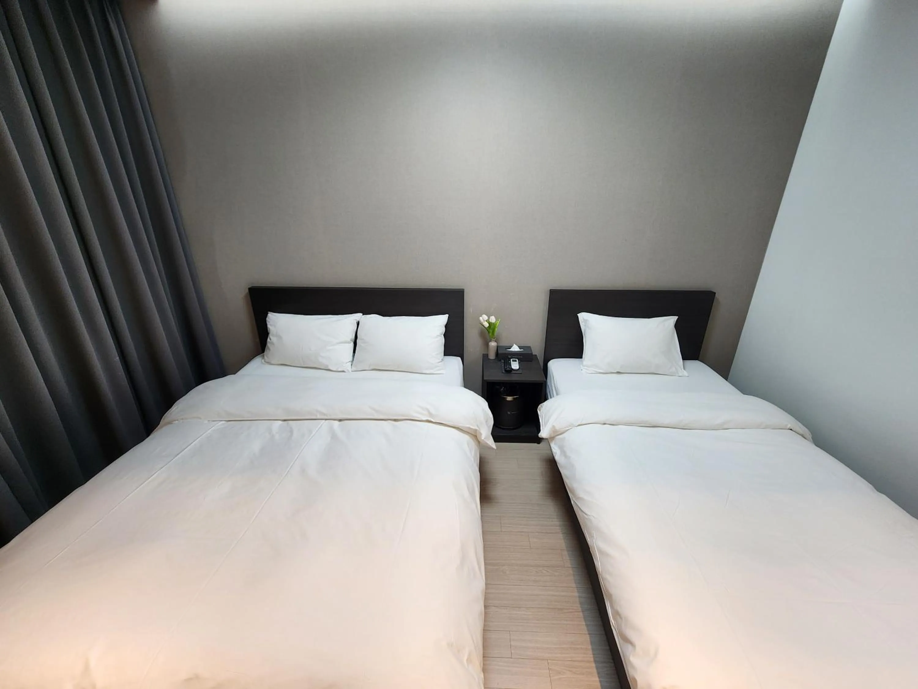 Bed in World State Hotel Sokcho