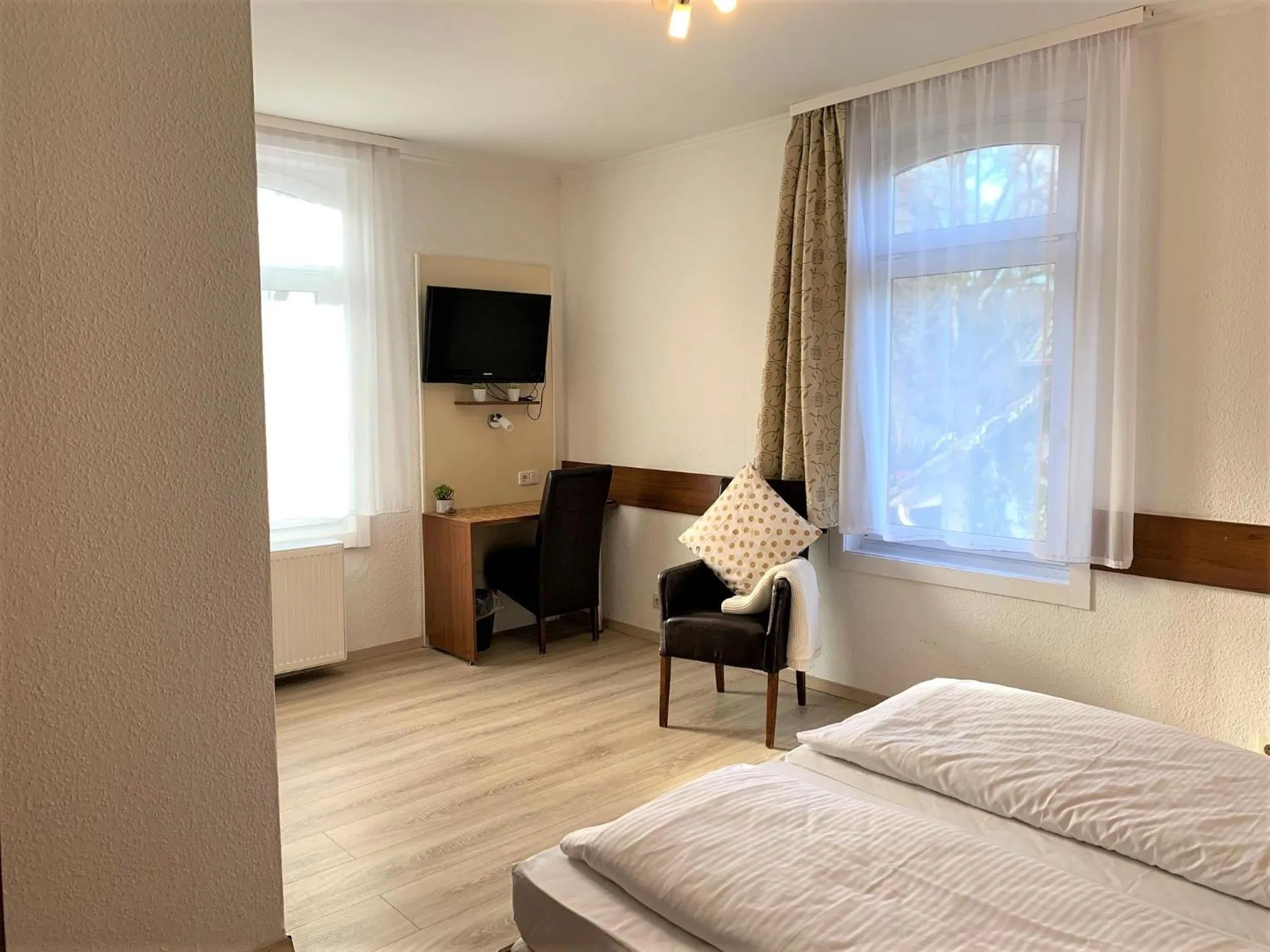 Seating area, Bed in Hotel zum Adler