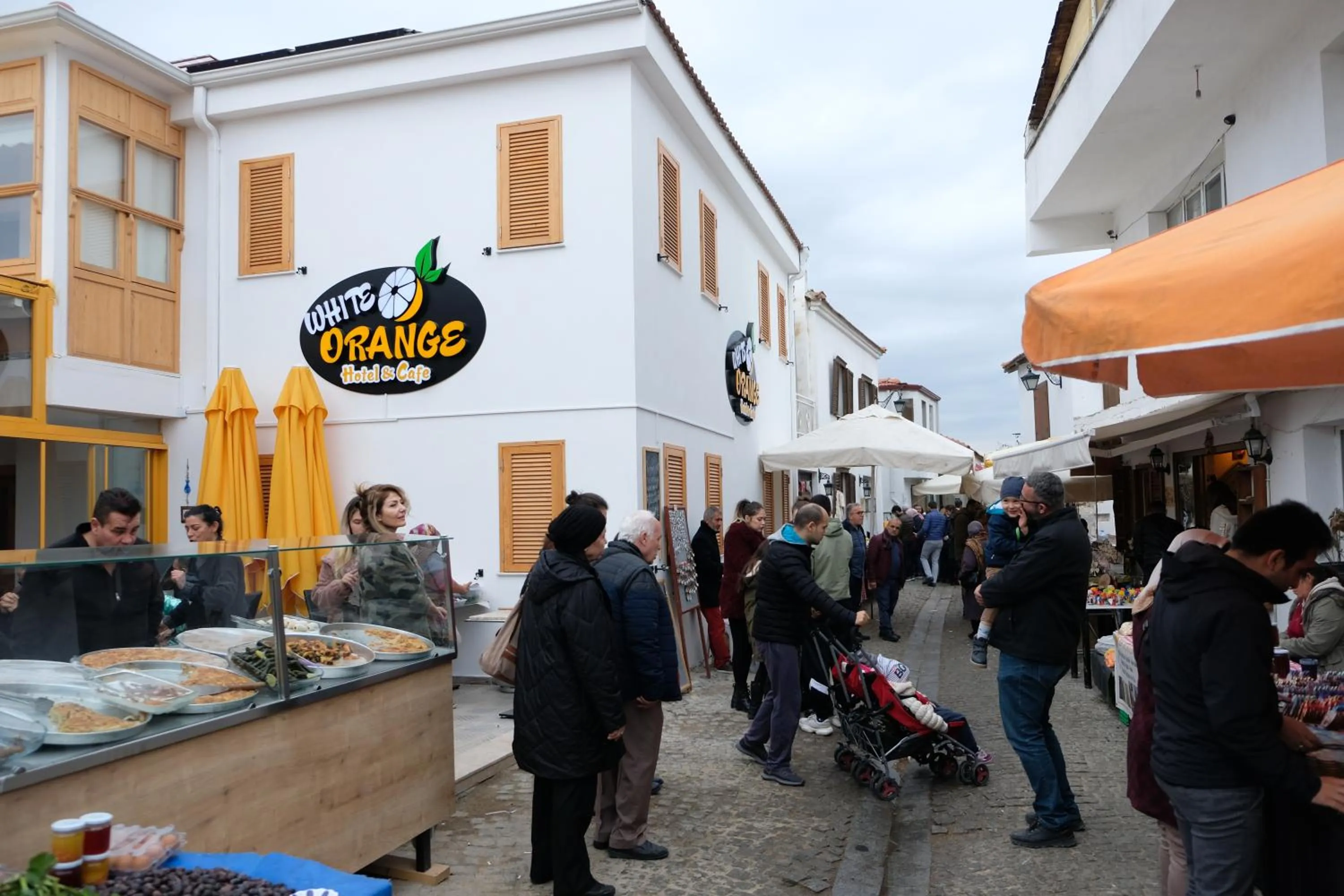 People in White Orange